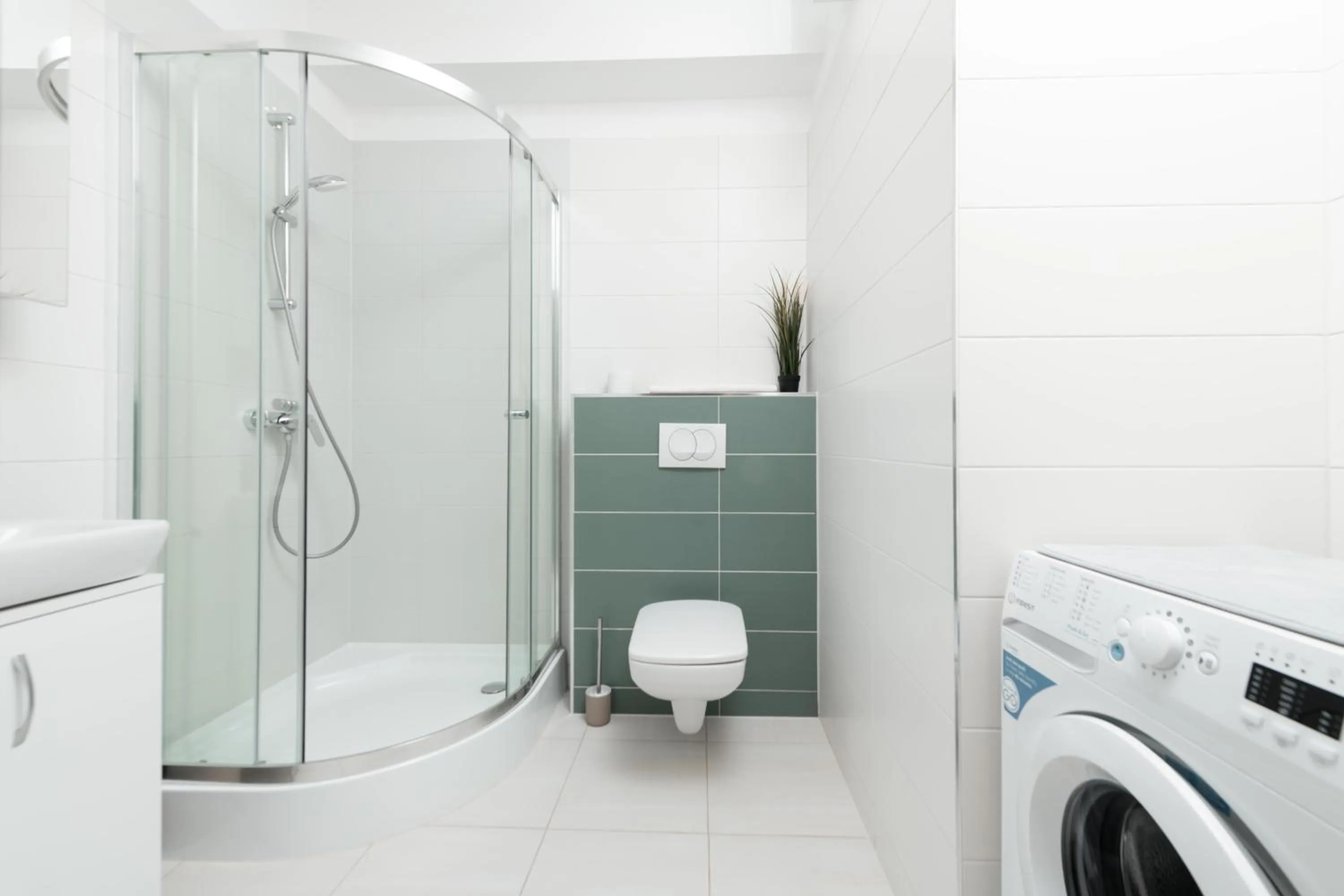 Shower in WaterFront City Apartments by FirstHost