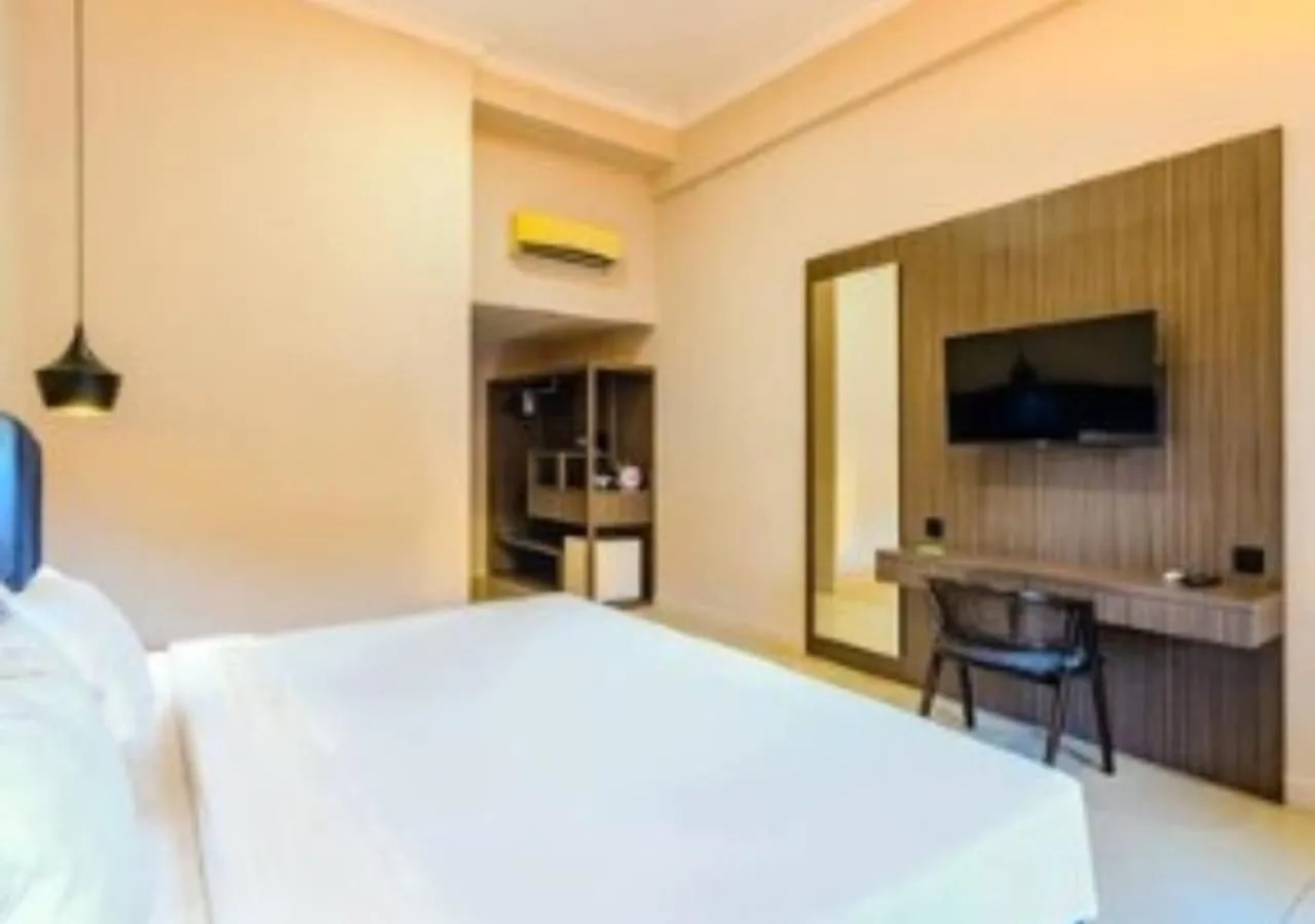 Communal lounge/ TV room, Bed in Marine Bay Sanur