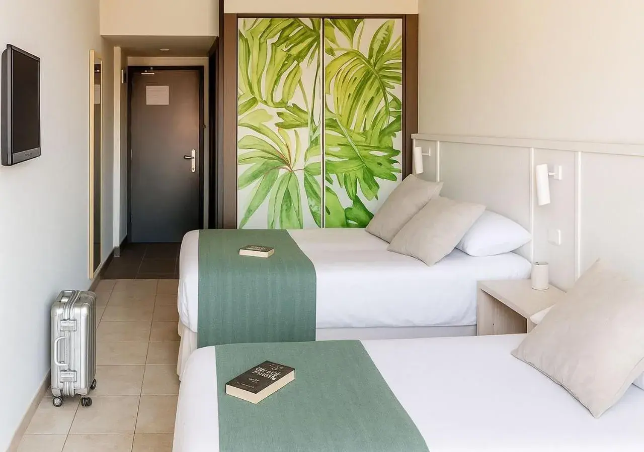 Design Triple Room (2 Adults + 1 Child) in AQUA Hotel Bertran Park Design Triple Room (2 Adults + 1 Child) in AQUA Hotel Bertran Park