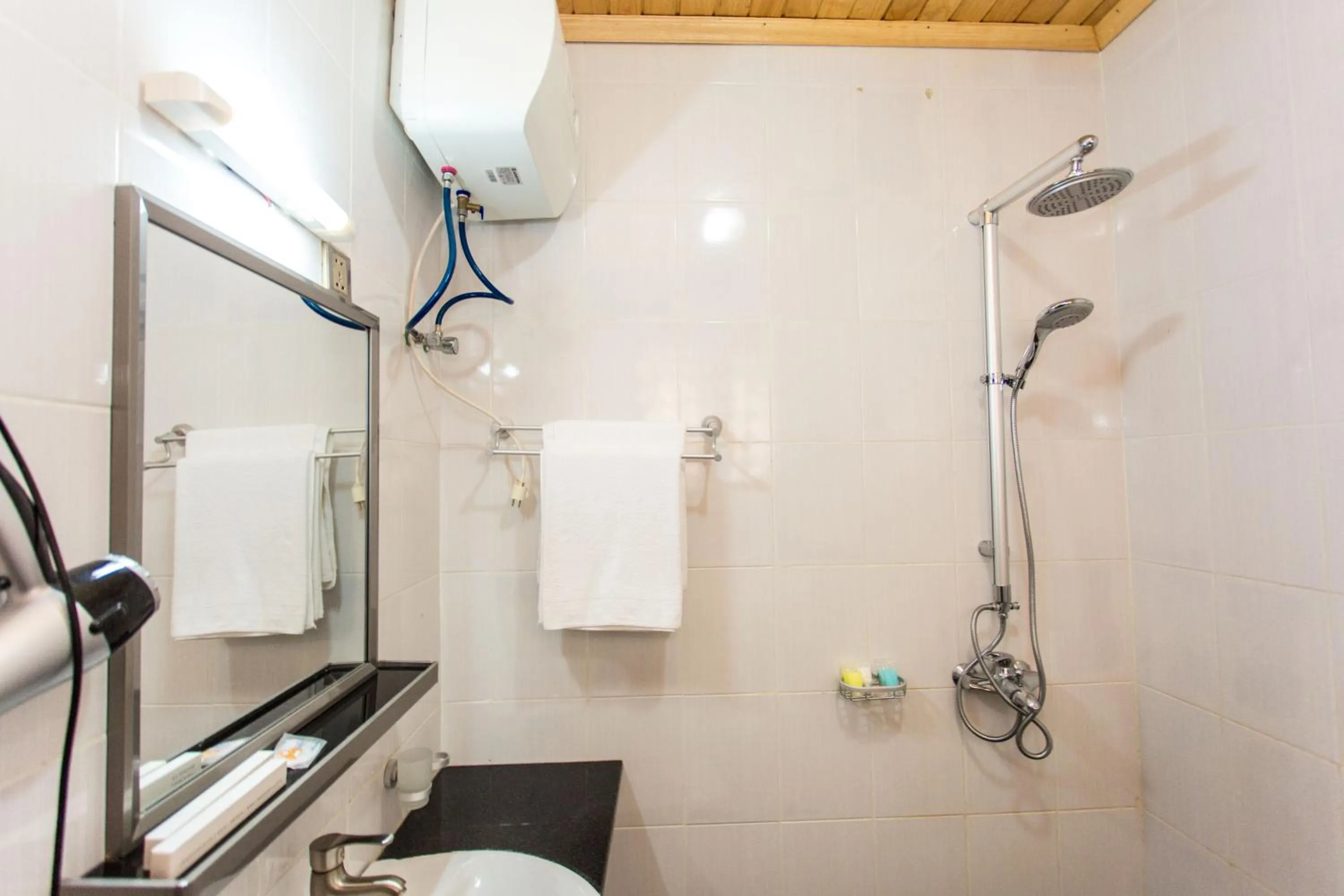 Shower in Nirvana Heights Hotel