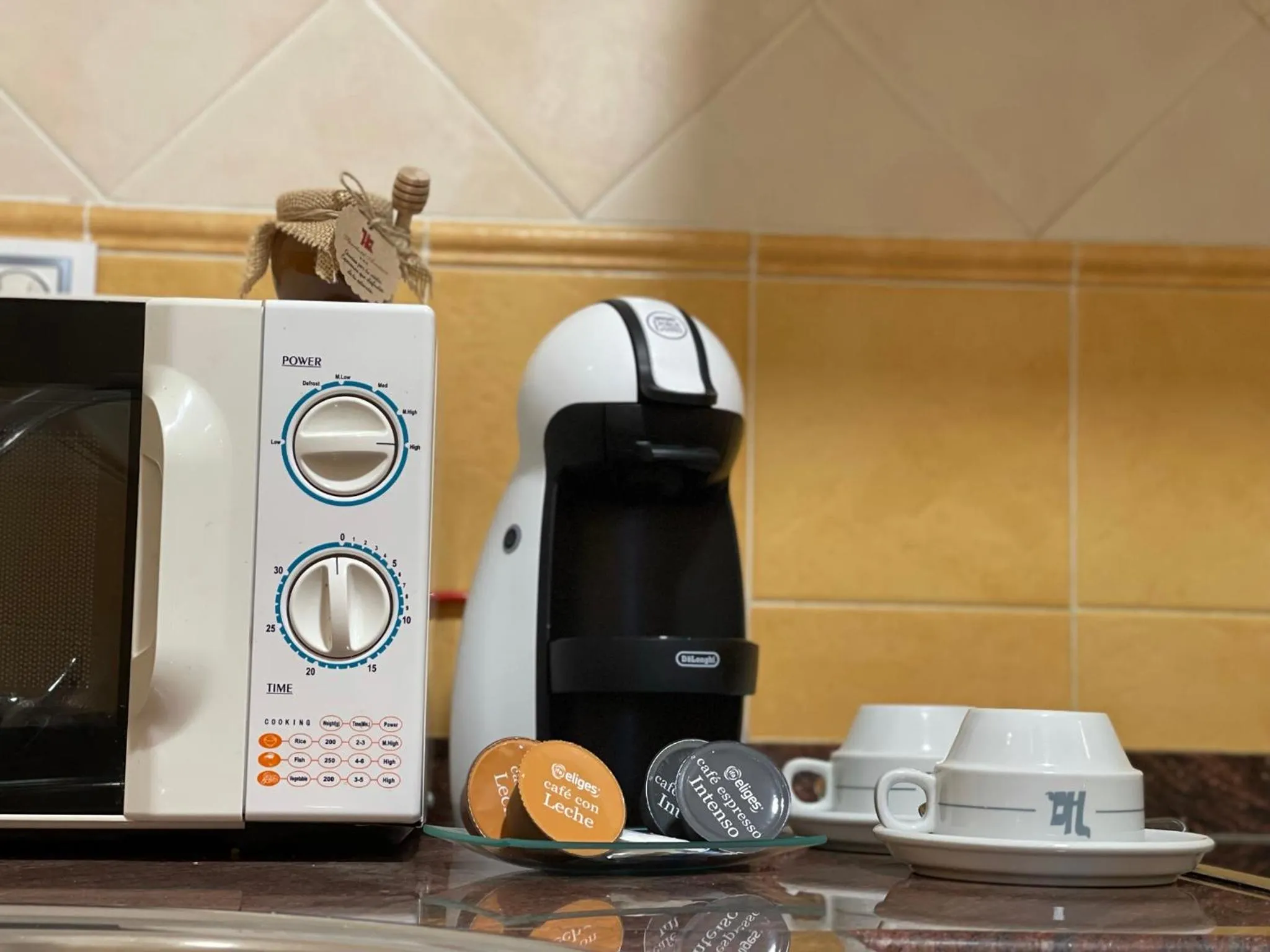 Kitchen or kitchenette in Aparthotel Arenteiro