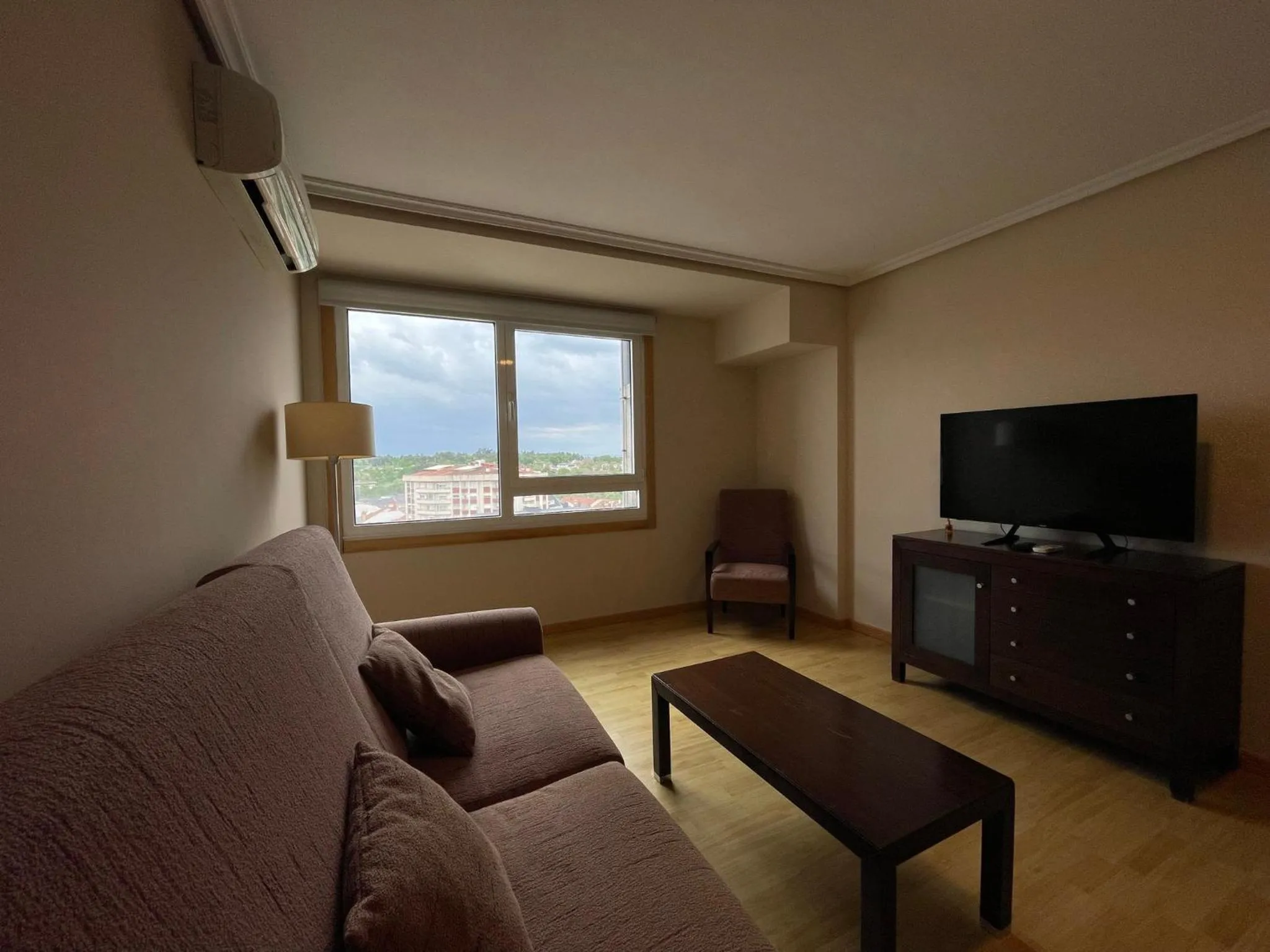 Living room in Aparthotel Arenteiro