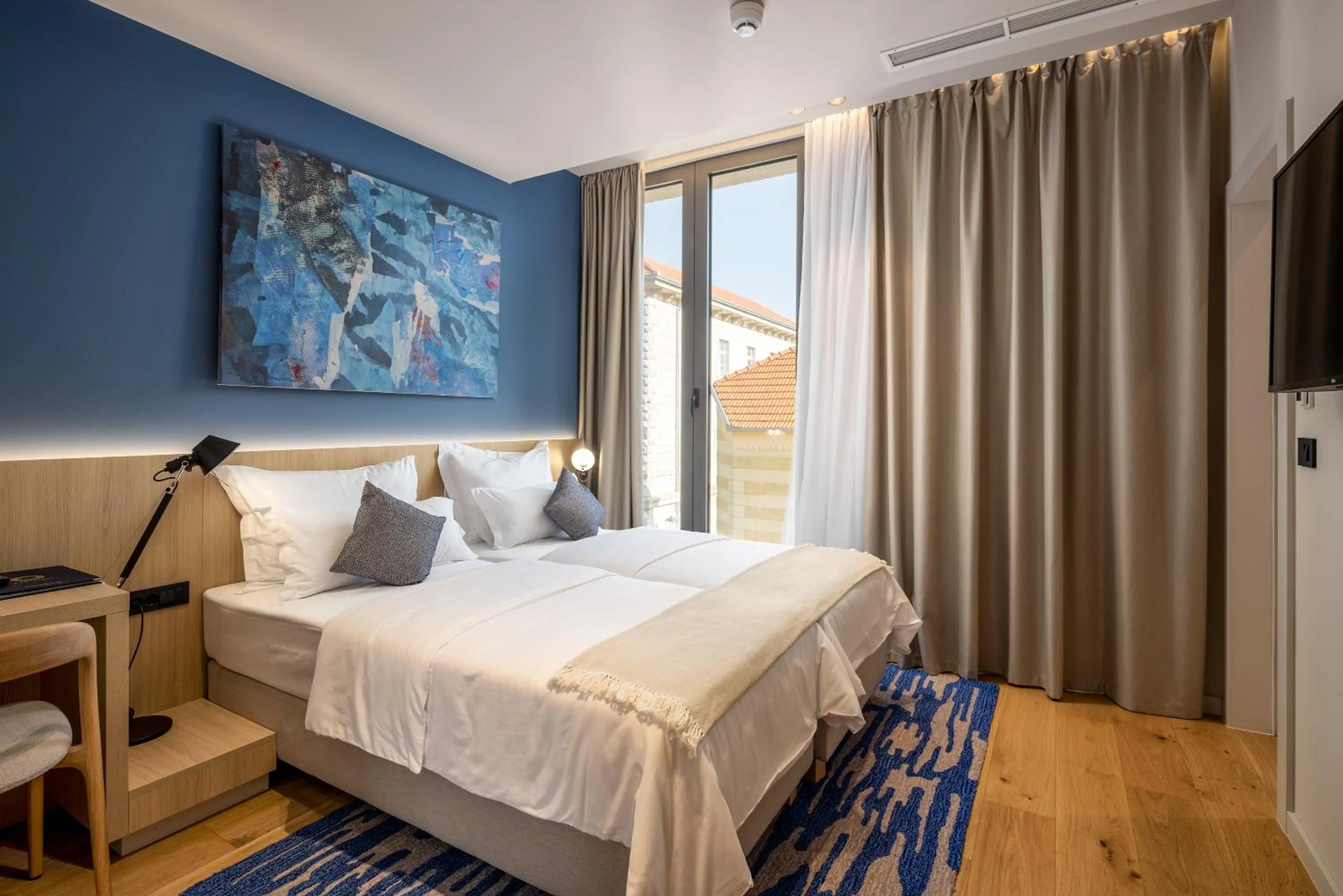 Bed in Emotheo Heritage Hotel