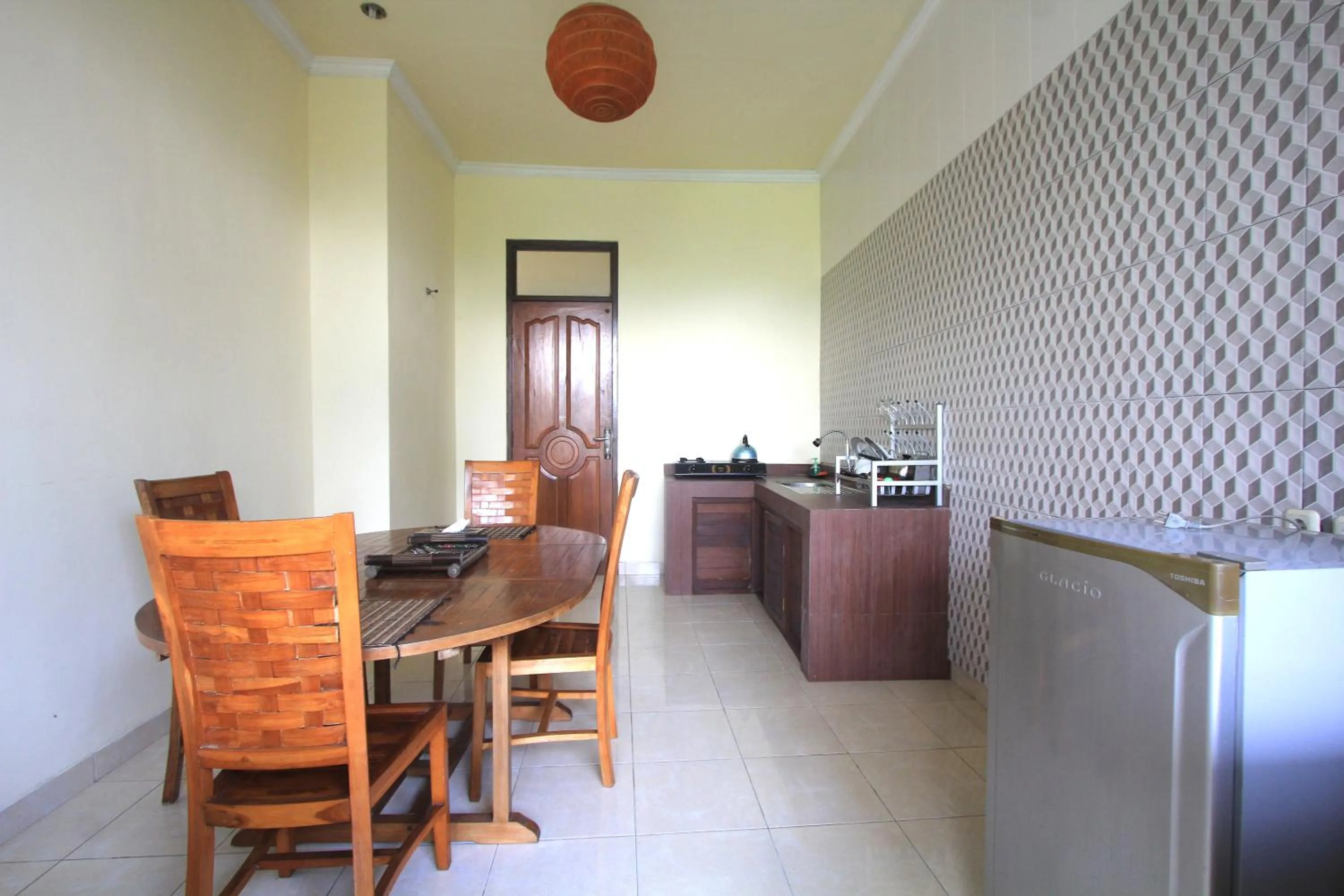 Kitchen or kitchenette in SUARA SIDHI Villa Ubud Bali