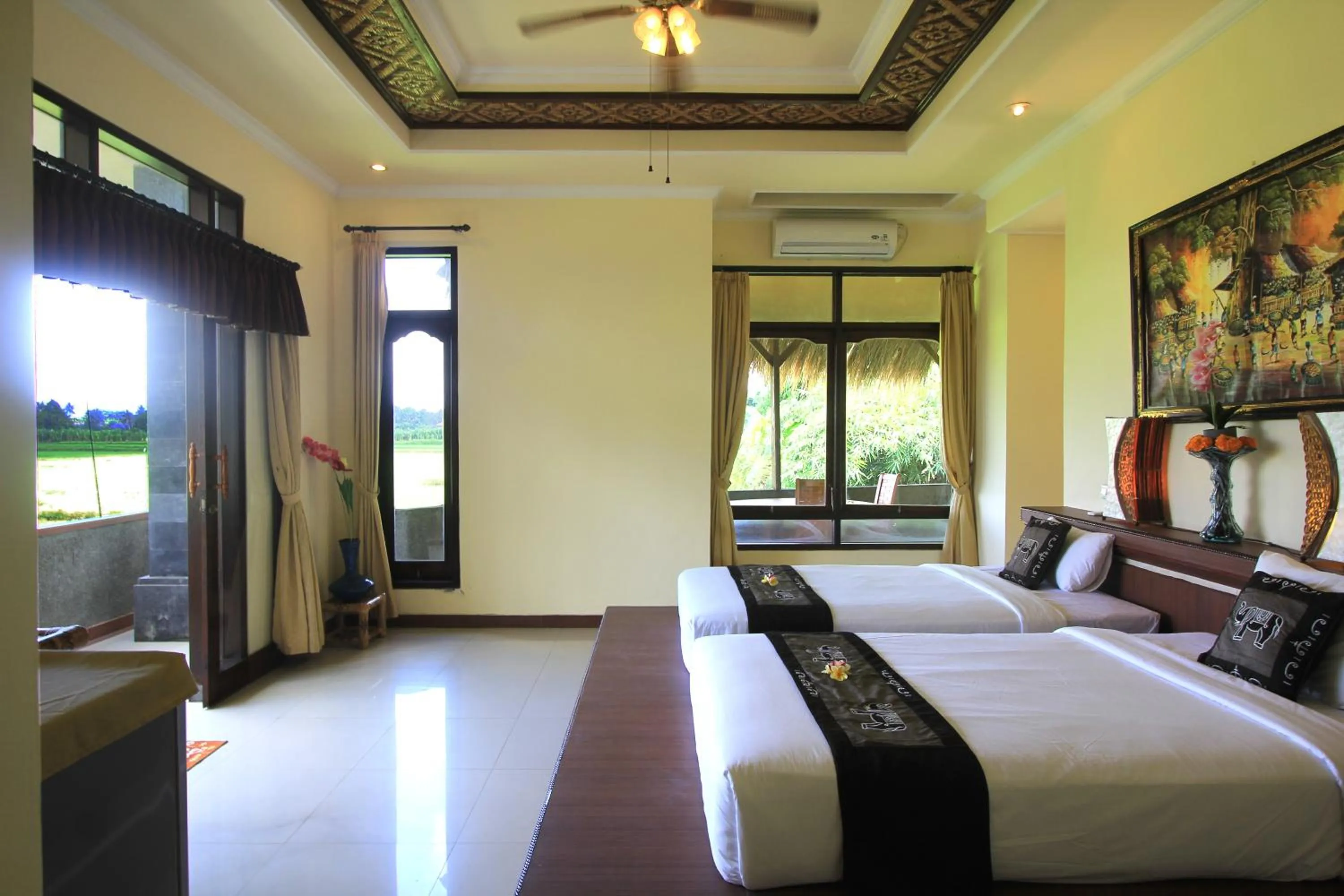 Bed in SUARA SIDHI Villa Ubud Bali
