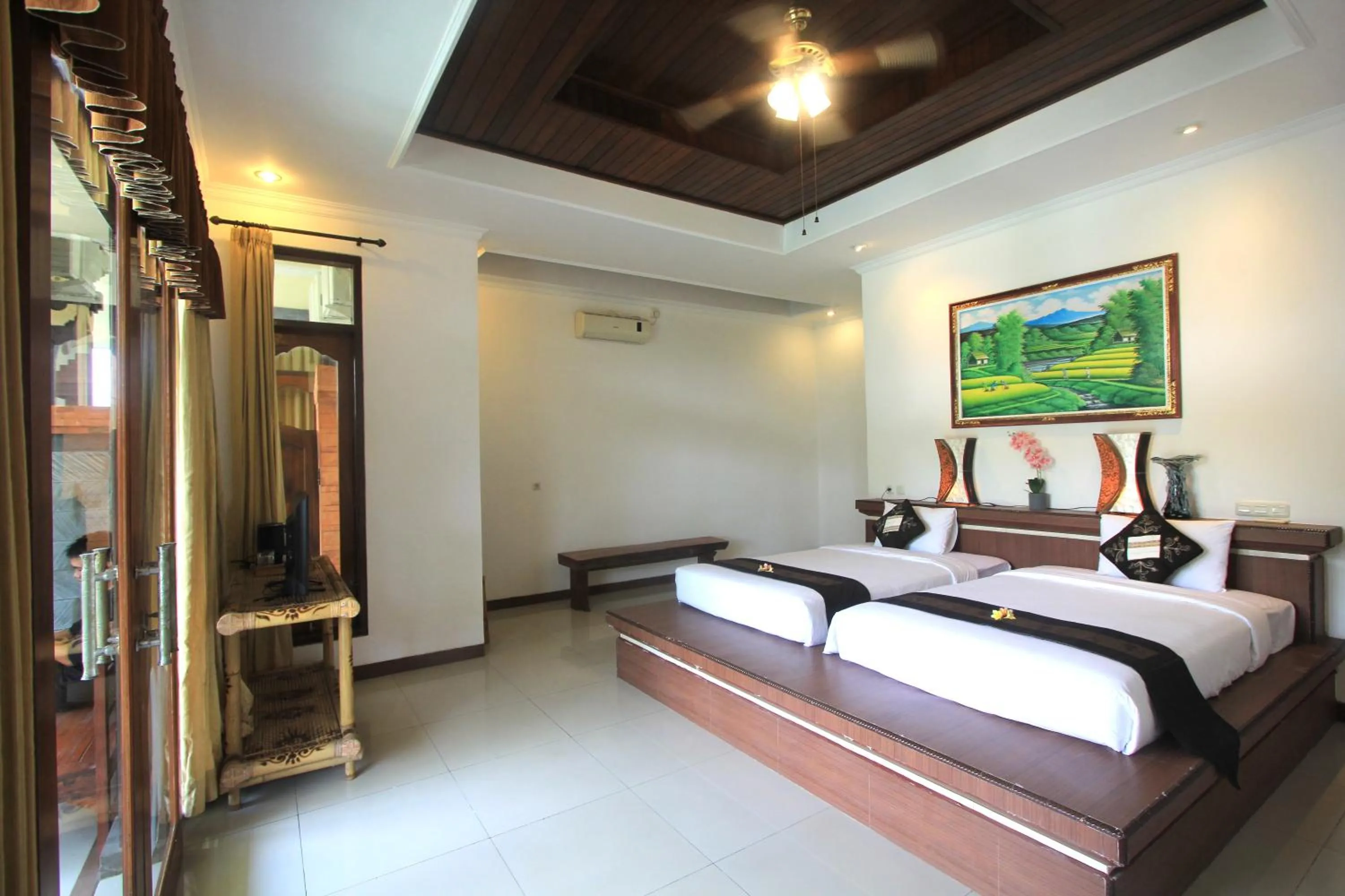 Bed in SUARA SIDHI Villa Ubud Bali