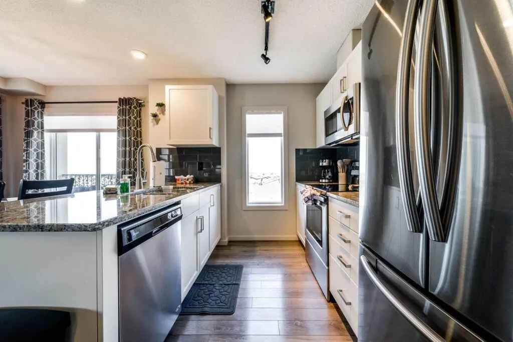 Kitchen or kitchenette in Bright Luxe Condo, AC, Top Floor, King Bed, Balcony!