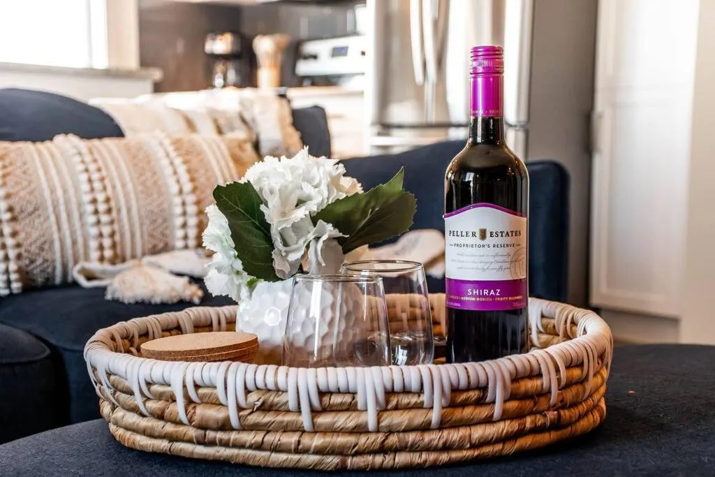 Living room in Bright Luxe Condo, AC, Top Floor, King Bed, Balcony!