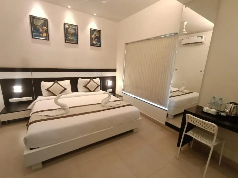 towels, Bed in Yuvraj Palace Inn