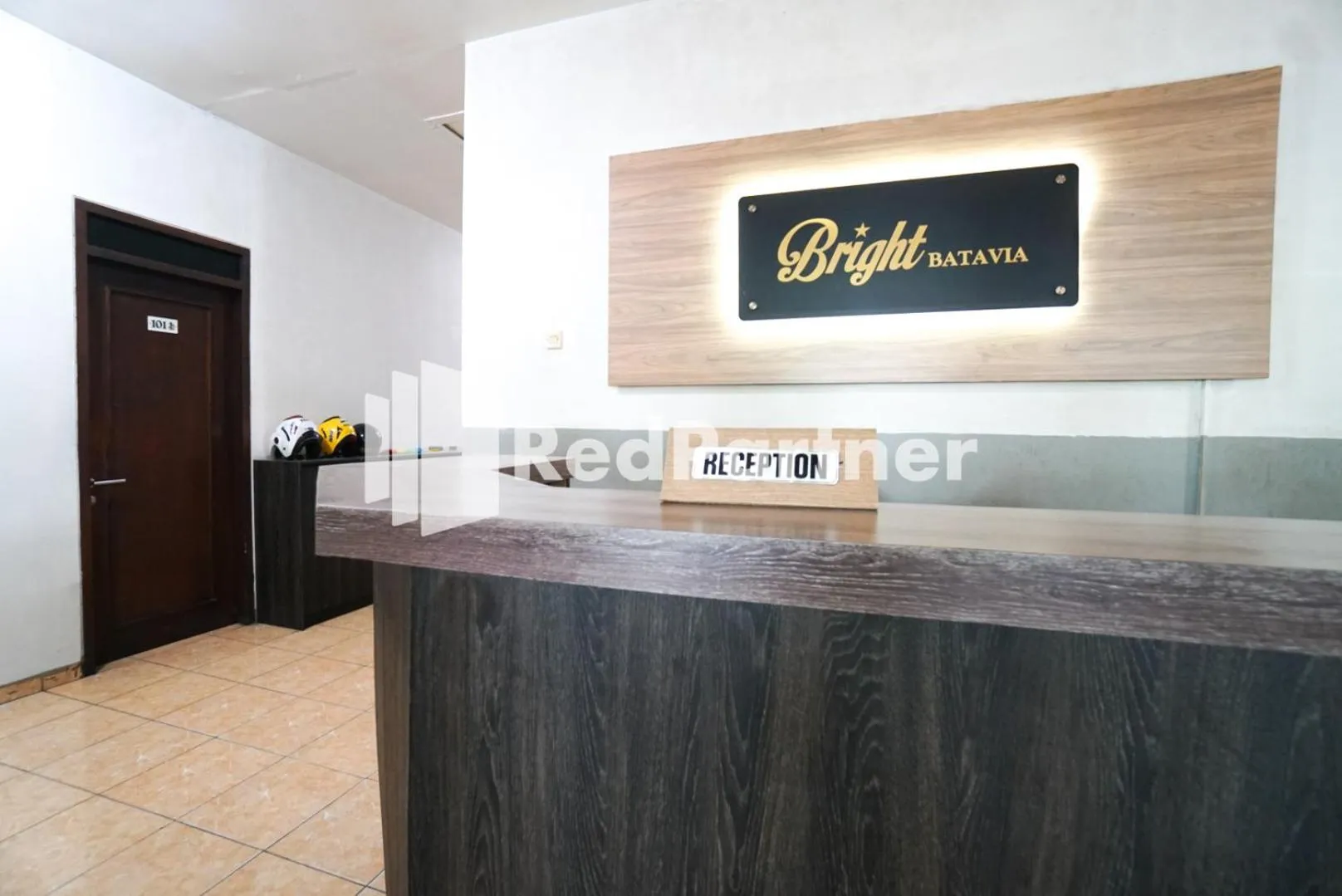 Lobby or reception in Bright Residence near ITC Mangga Dua Mitra RedDoorz