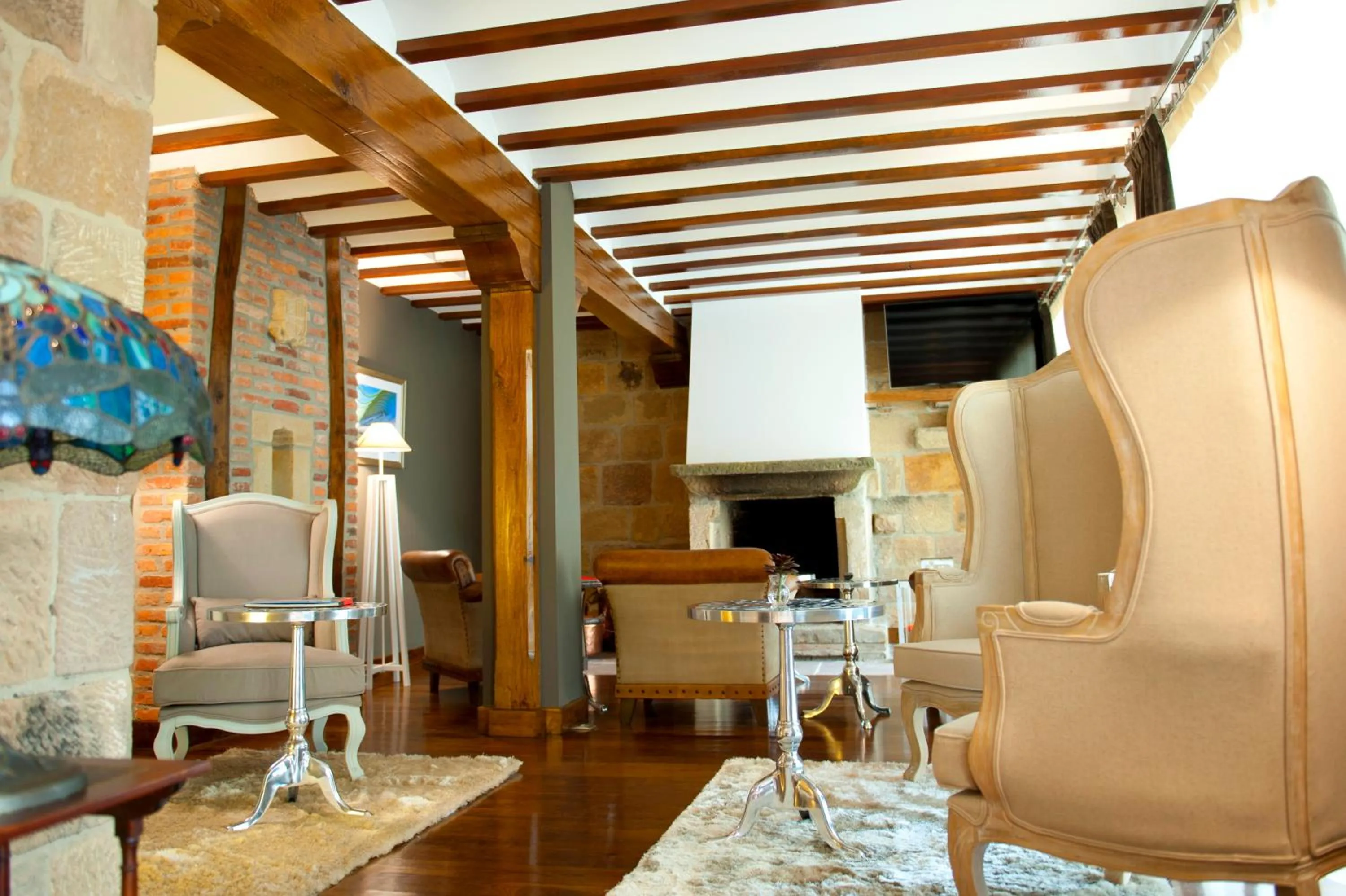 Communal lounge/ TV room in Costa Esmeralda Suites