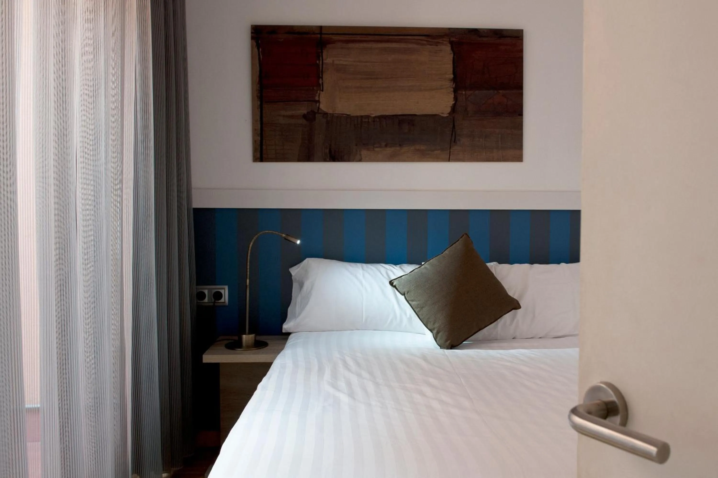 Bedroom, Bed in MH Apartments Liceo