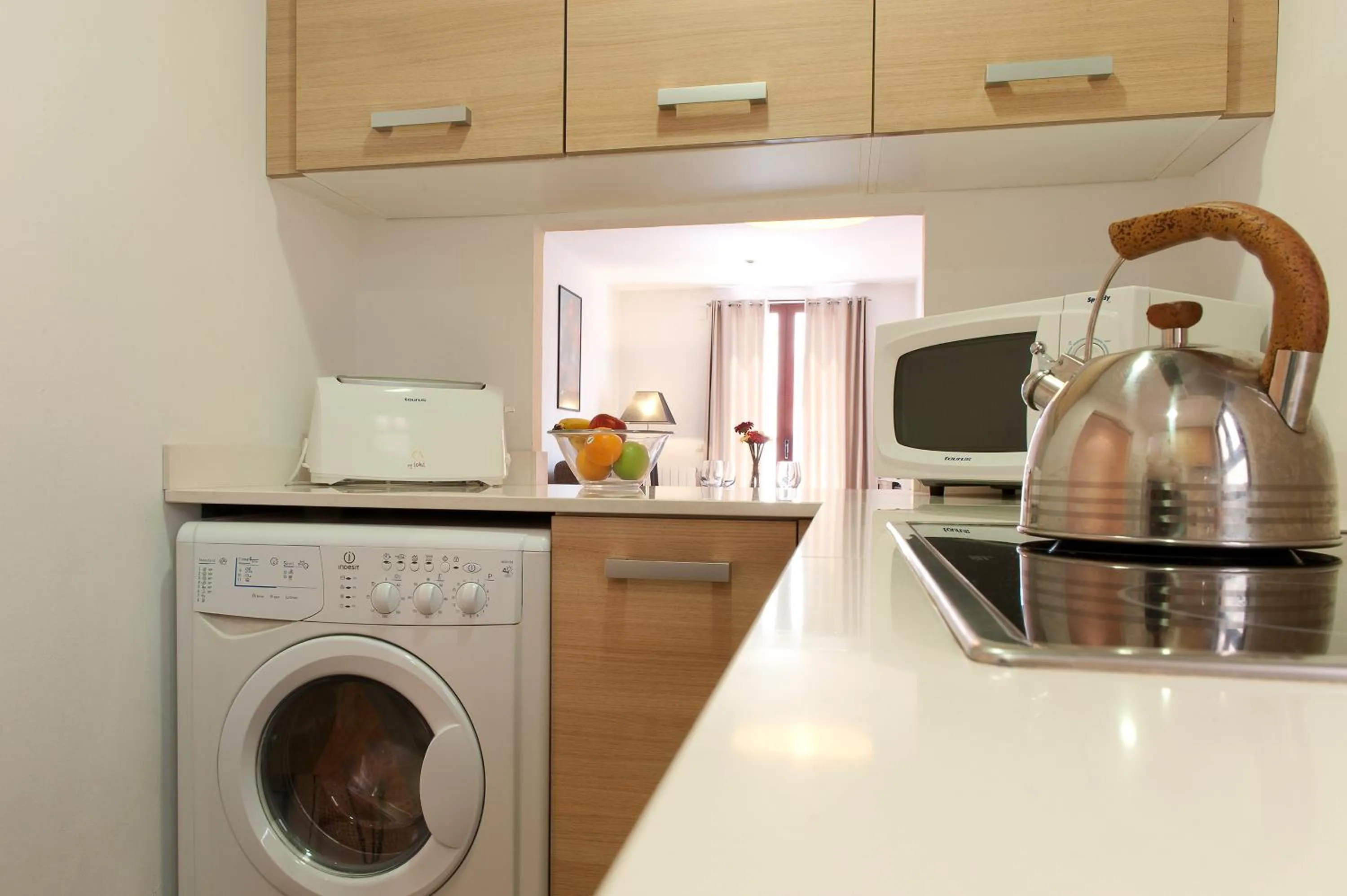 Kitchen or kitchenette in MH Apartments Liceo