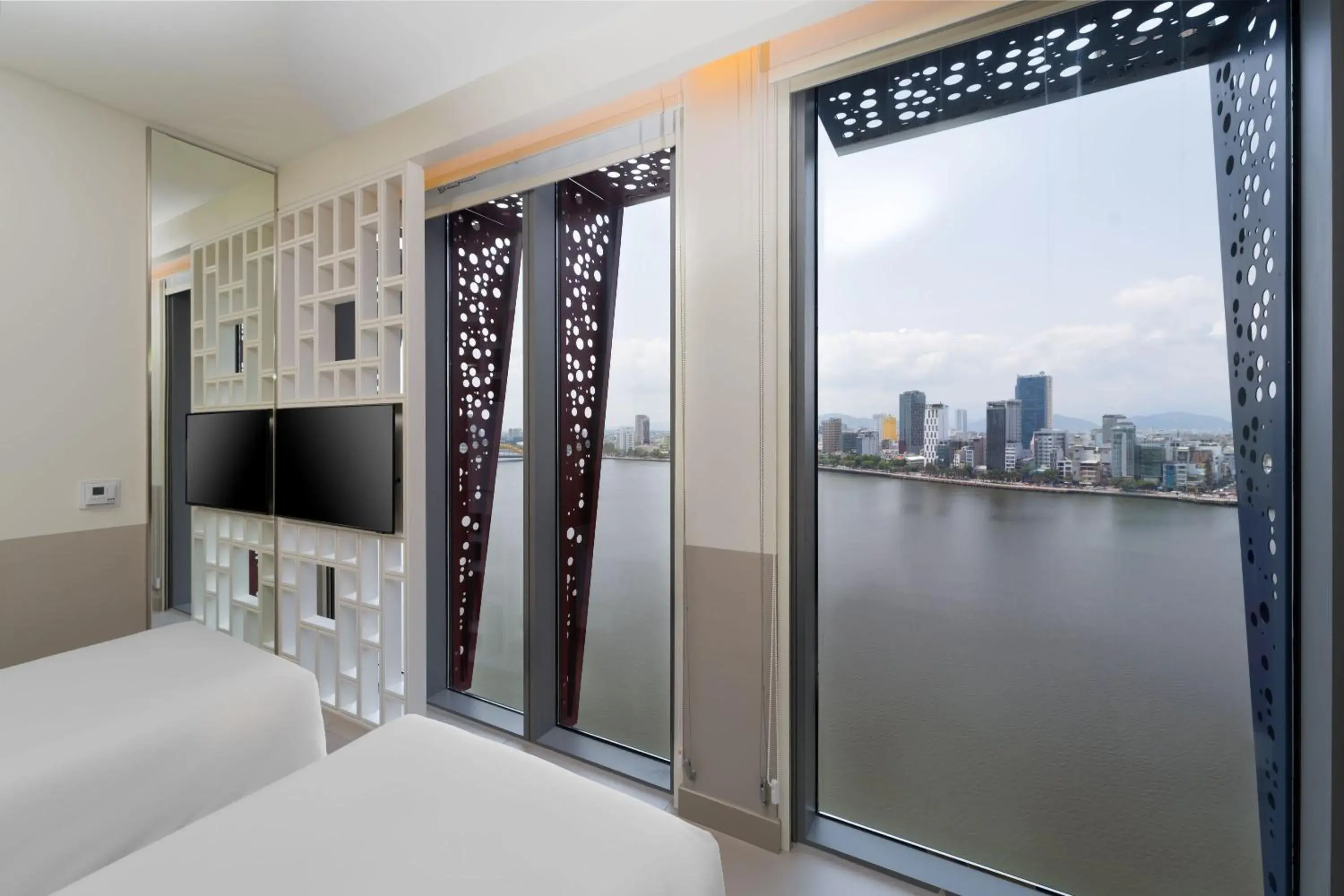 Triple Room with View in Wink Icon Hotel Danang Riverside - Luxury Suites - 24hrs Stay & Rooftop Pool Bar Triple Room with View in Wink Icon Hotel Danang Riverside - Luxury Suites - 24hrs Stay & Rooftop Pool Bar