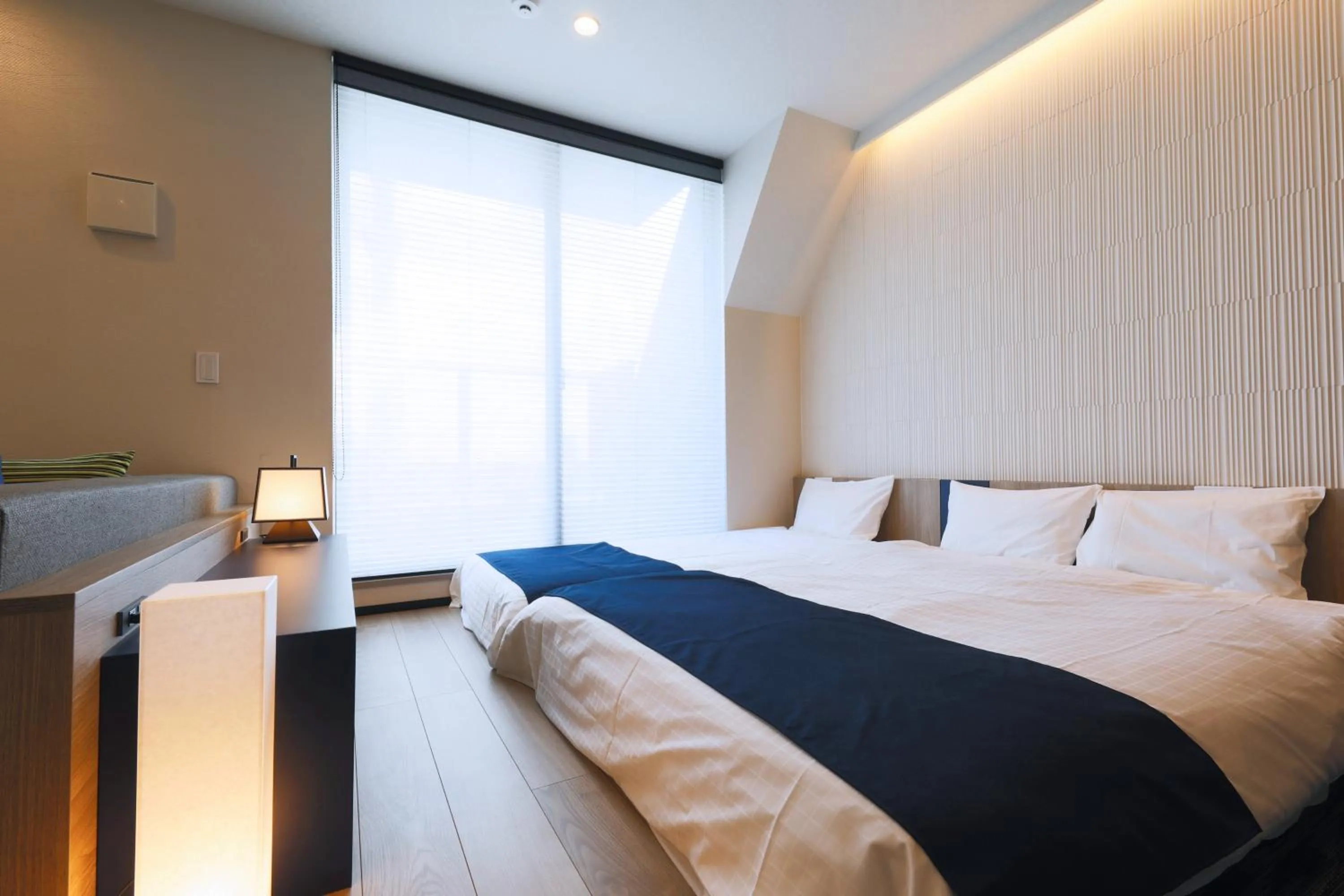 Bed in stayme THE HOTEL Asakusa Riverside