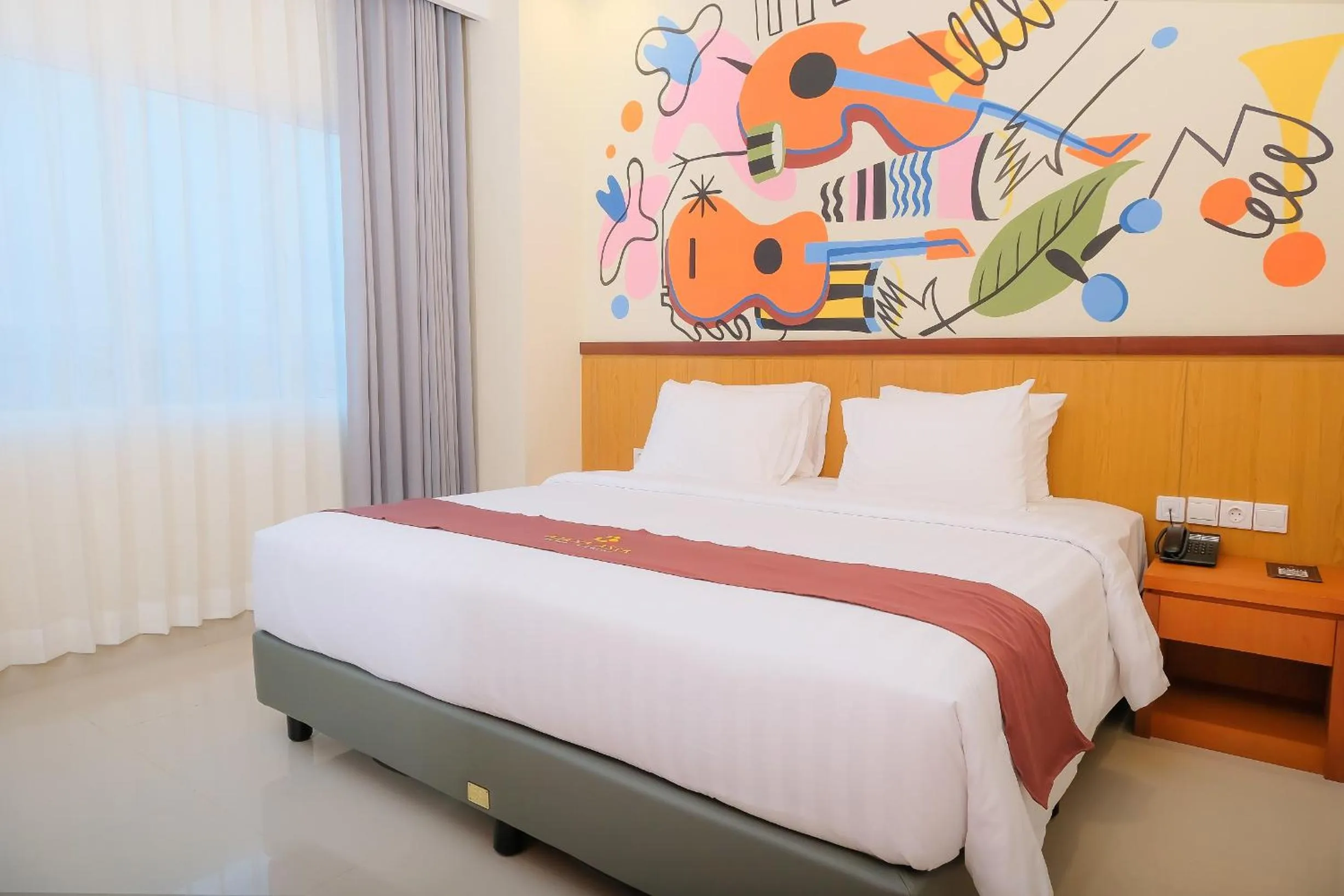 Bedroom, Bed in Azana Asia Hotel Cilacap