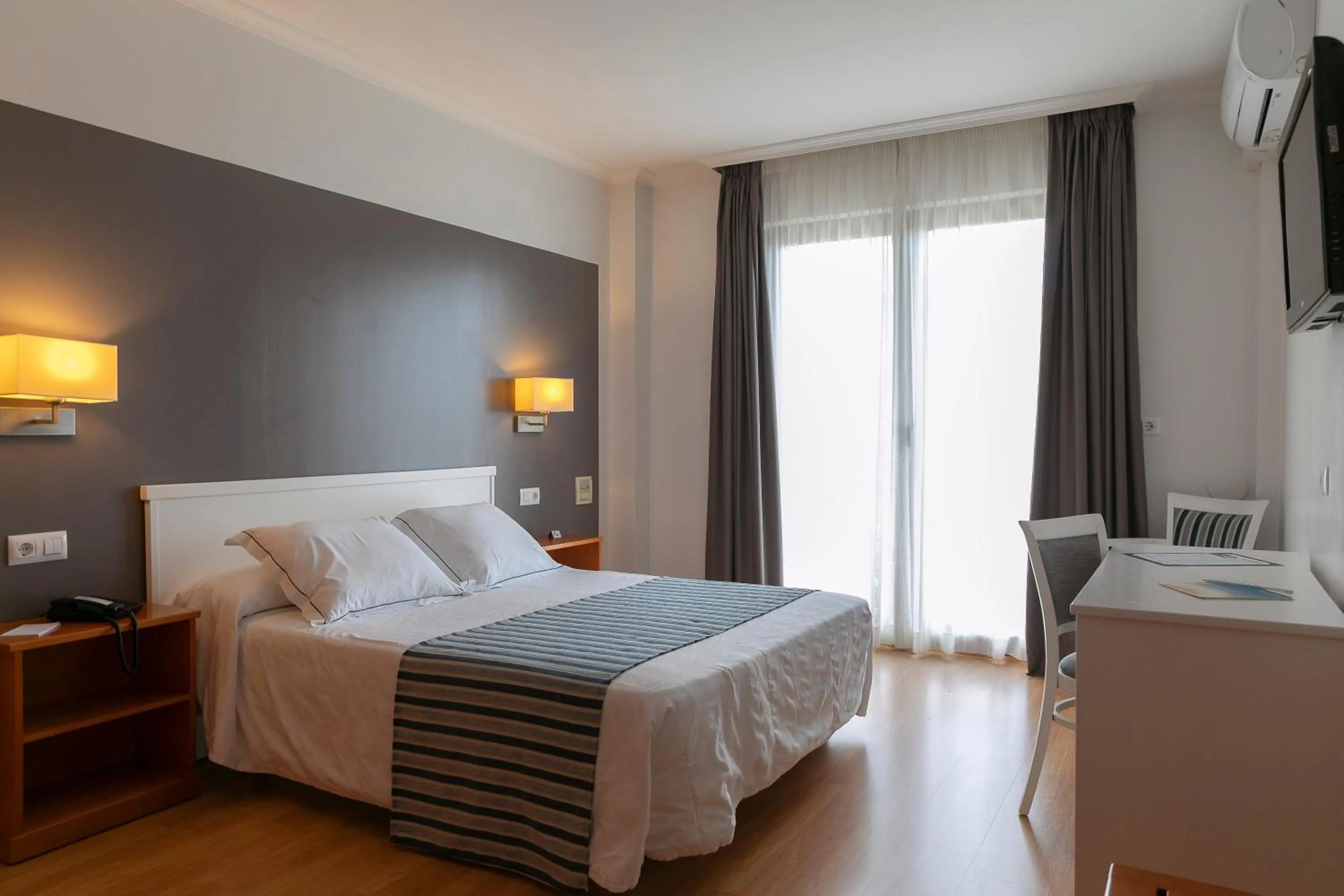 Bed in Hotel Lombiña