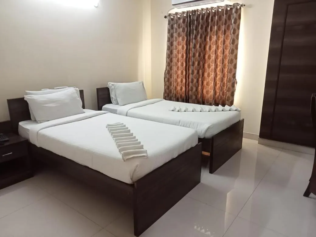 Bed in Chetinaad Courtyard Gandhipuram by Centre Park