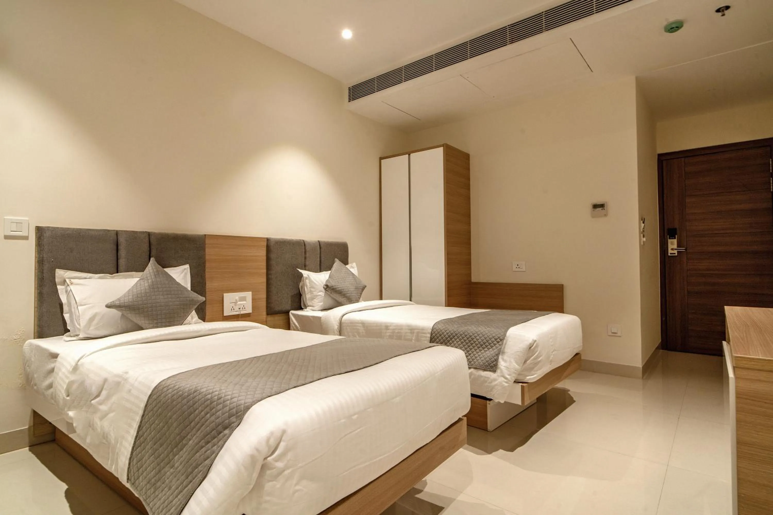 Bed in THE MANGAL VIEW RESIDENCY - A Luxury Boutique Business Hotel