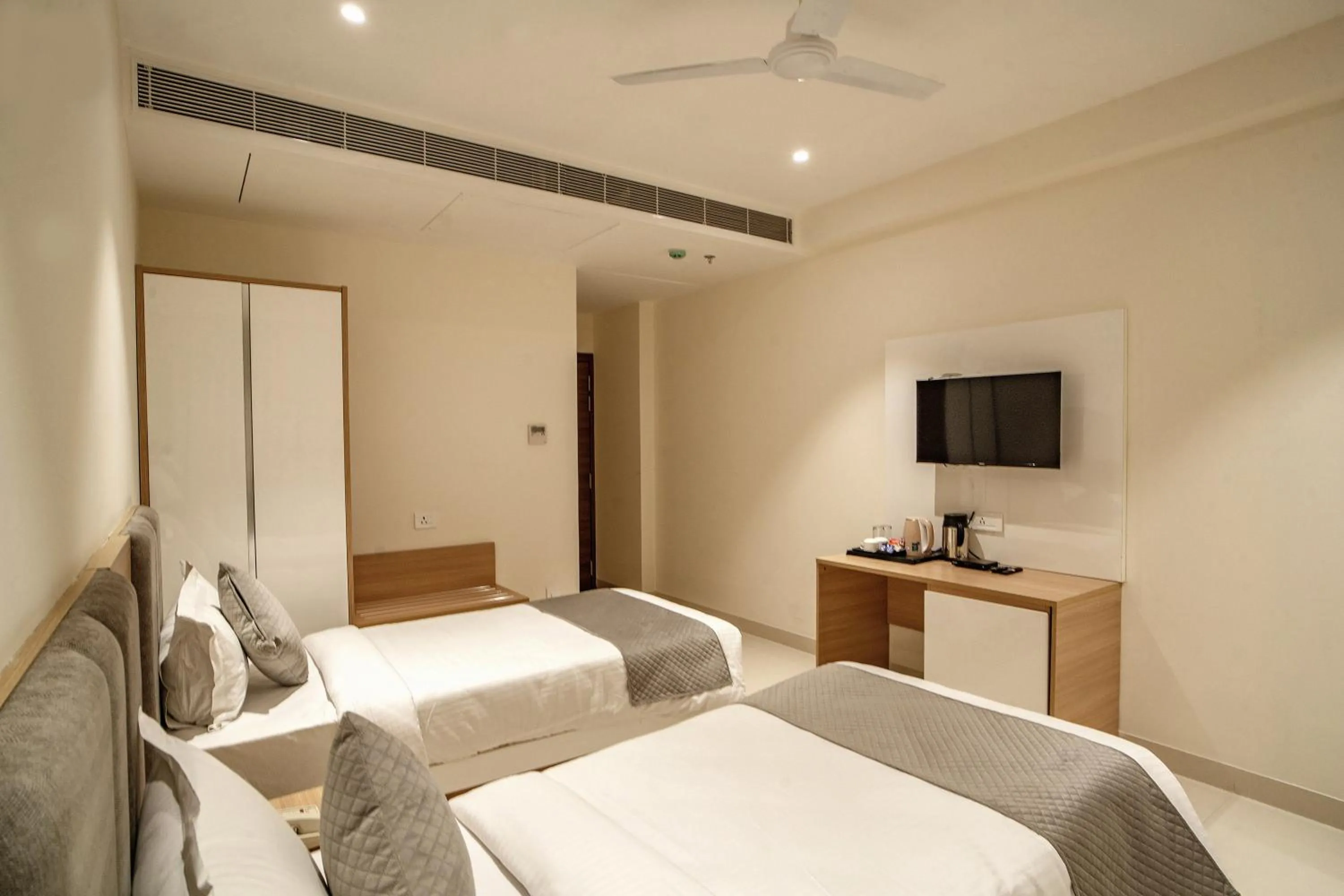 Bed in THE MANGAL VIEW RESIDENCY - A Luxury Boutique Business Hotel