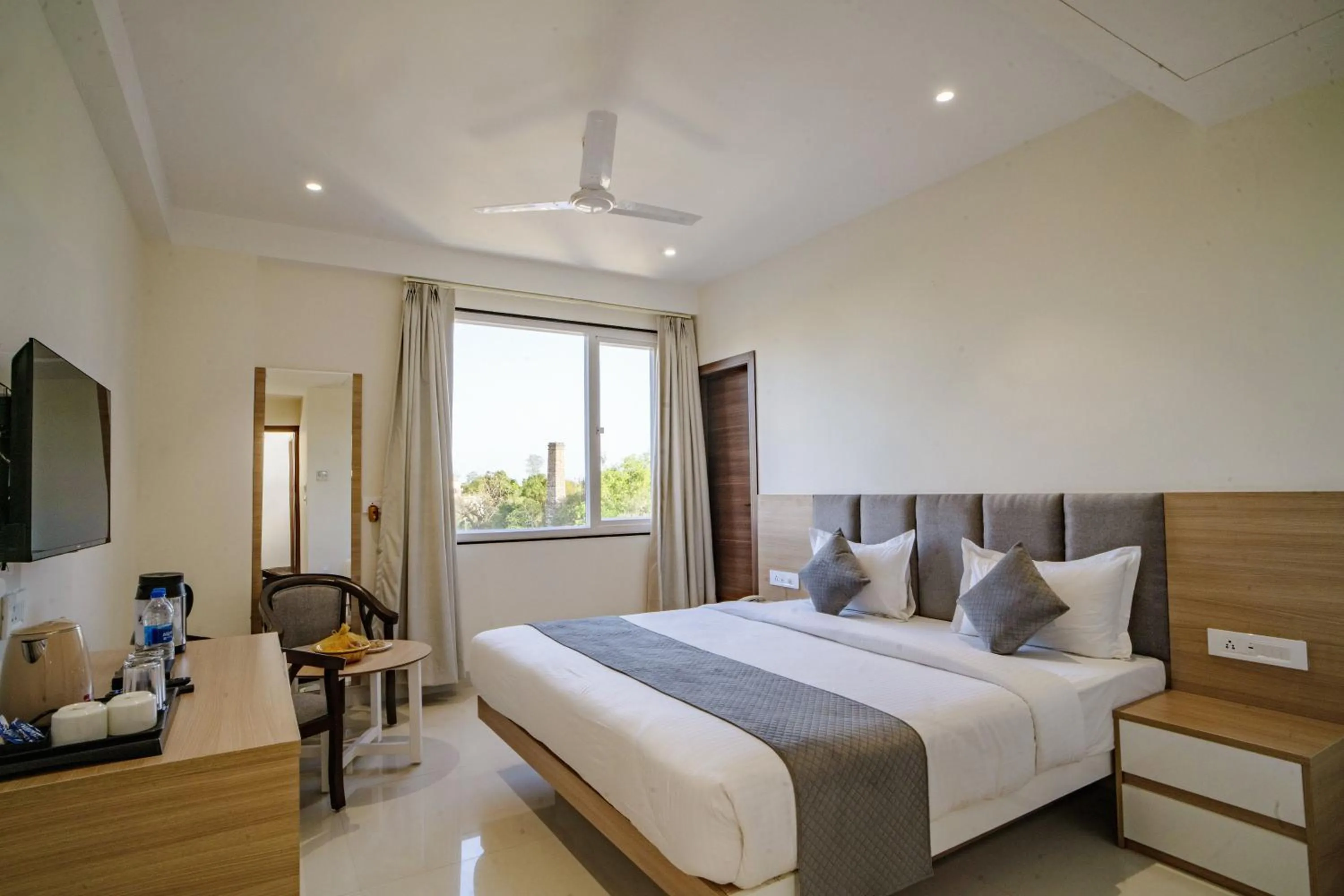 Bed in THE MANGAL VIEW RESIDENCY - A Luxury Boutique Business Hotel