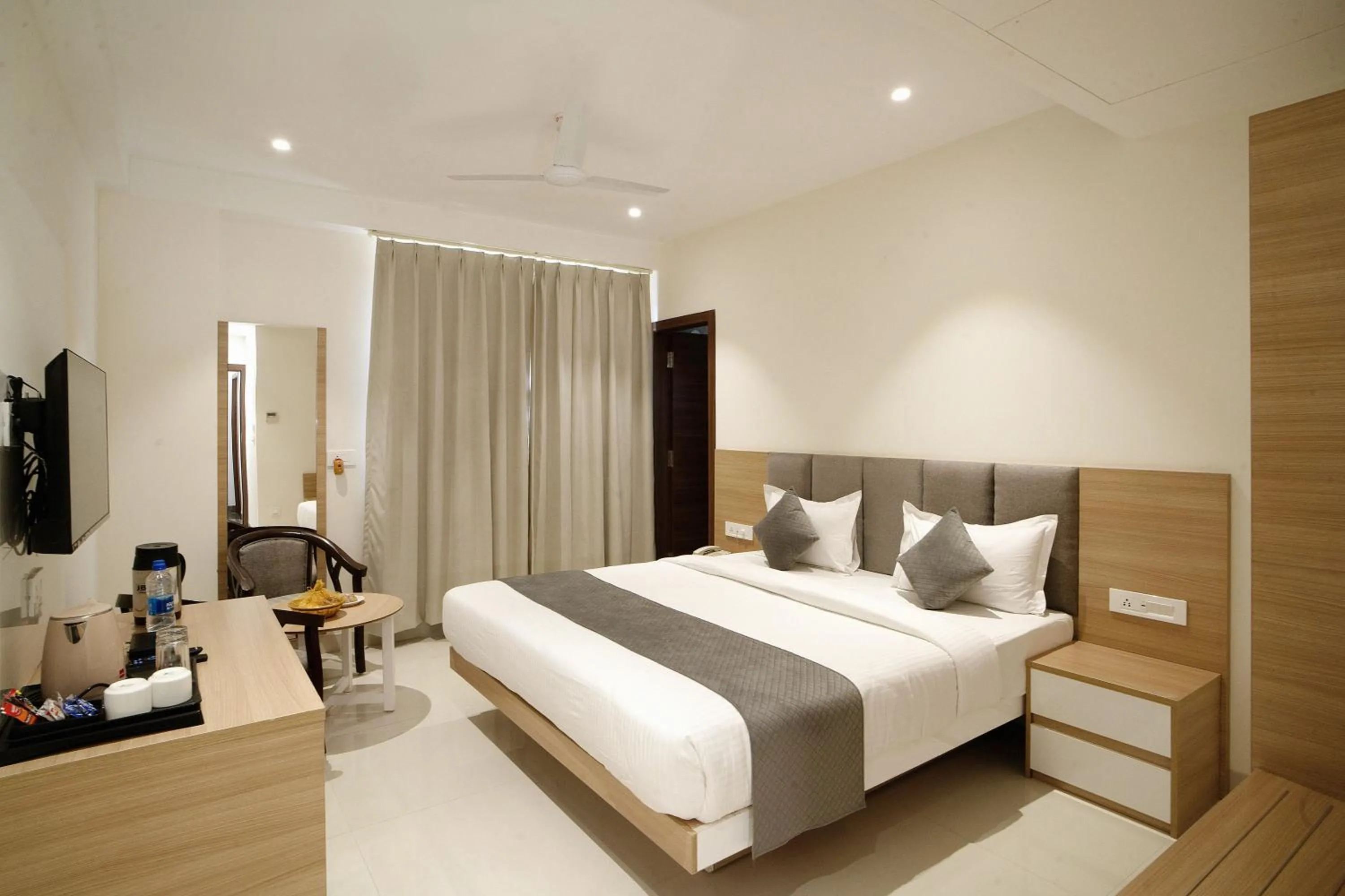 Bed in THE MANGAL VIEW RESIDENCY - A Luxury Boutique Business Hotel