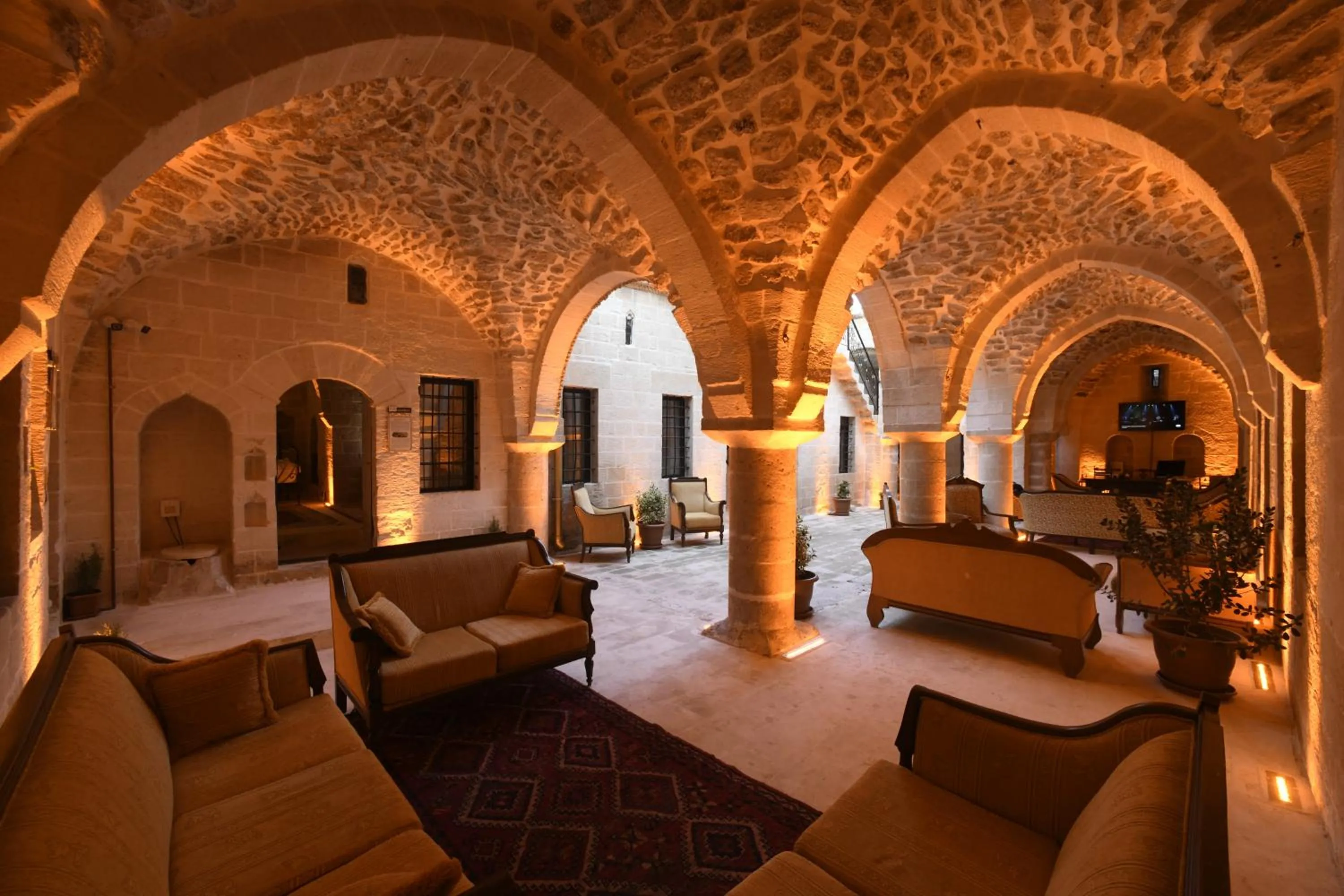 Communal lounge/ TV room in Legacy Mesopotamia Hotel