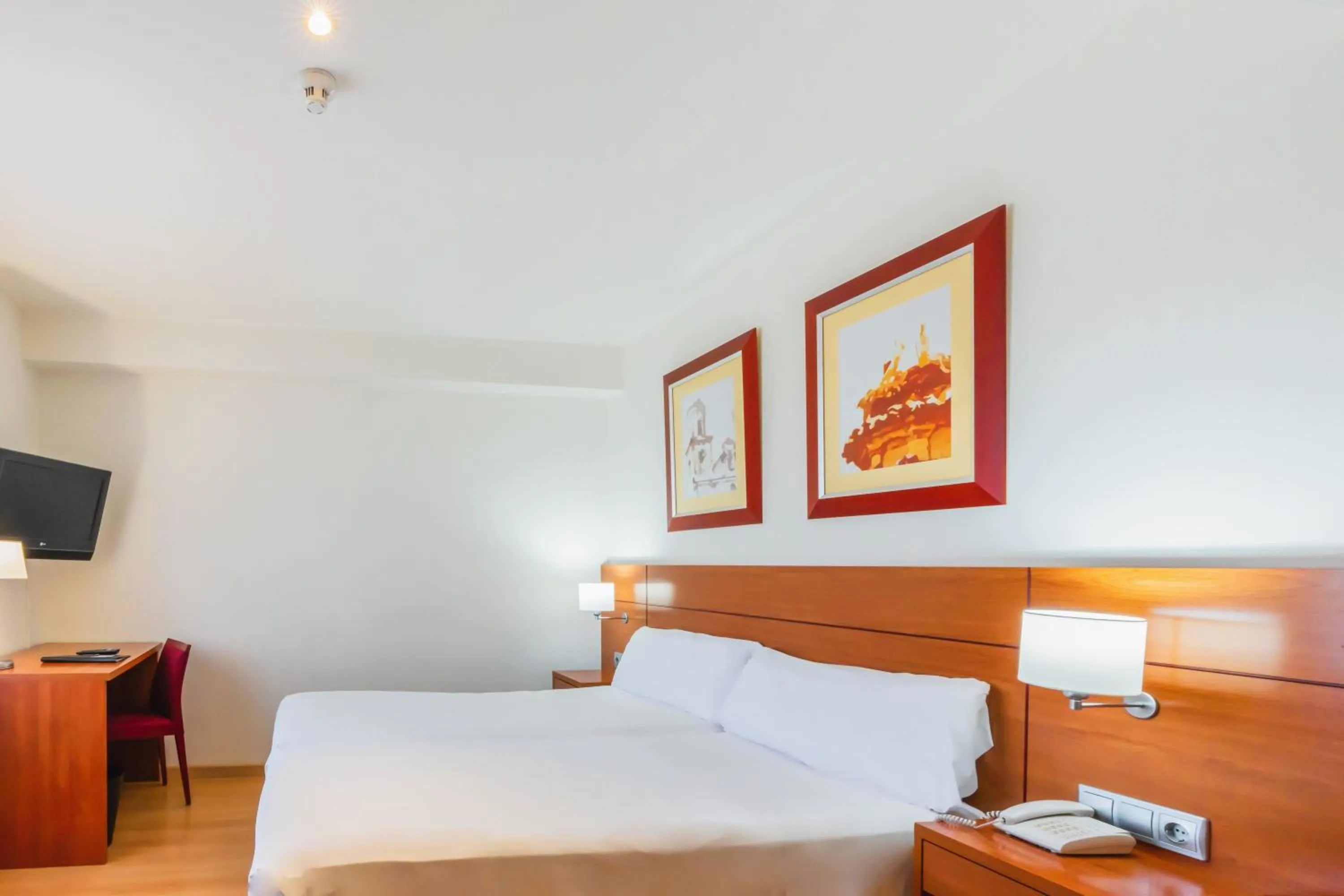 Bed in Hotel Palacios