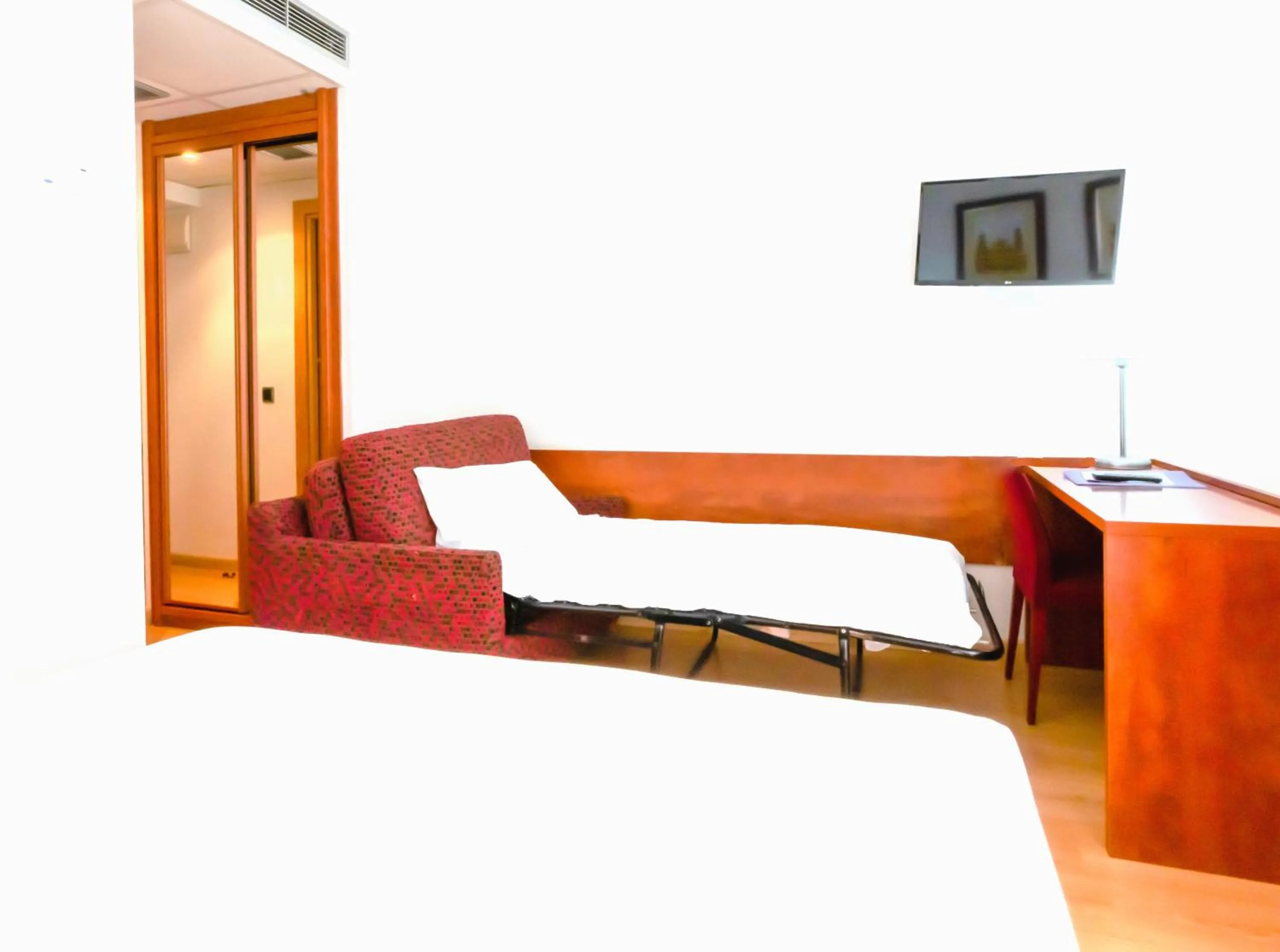 Bed in Hotel Palacios