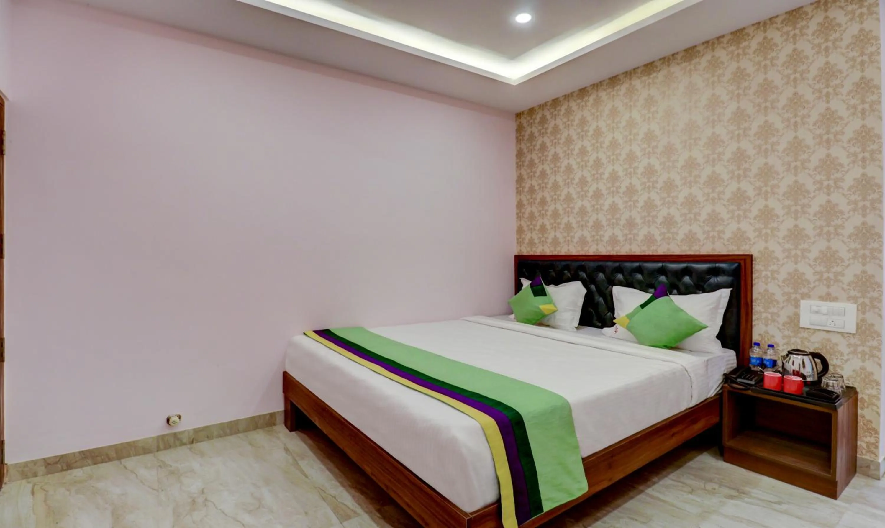 Bedroom, Bed in Treebo Three Street Inn