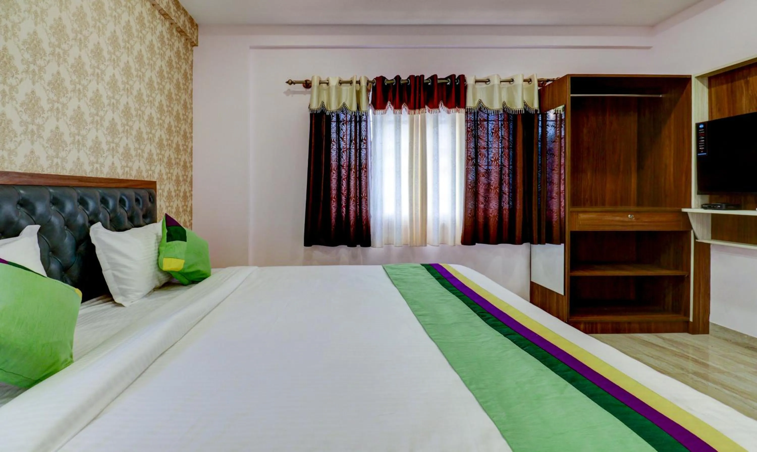 Bedroom, Bed in Treebo Three Street Inn