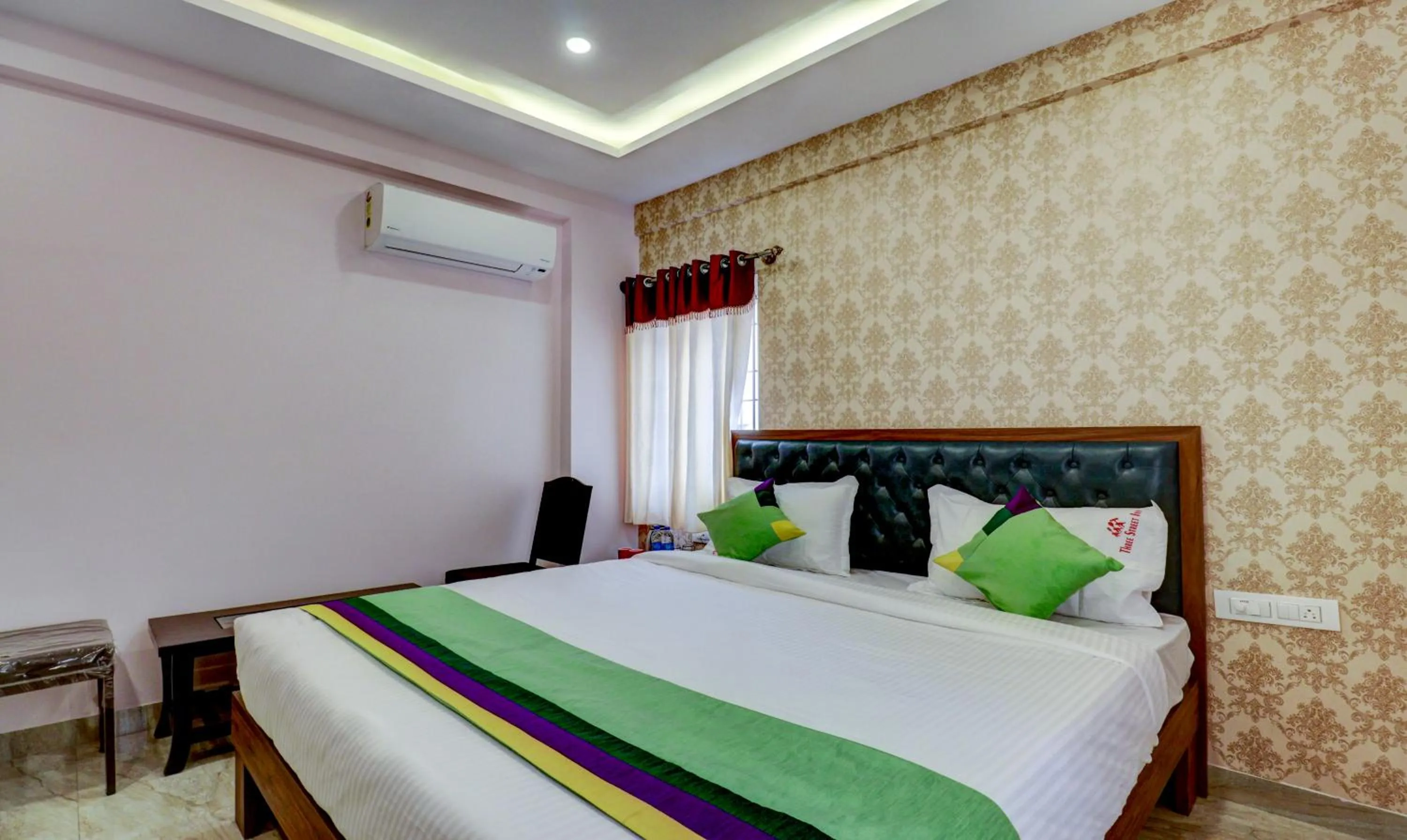 Bedroom, Bed in Treebo Three Street Inn