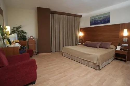 Photo of the whole room, Bed in BS Capitulaciones