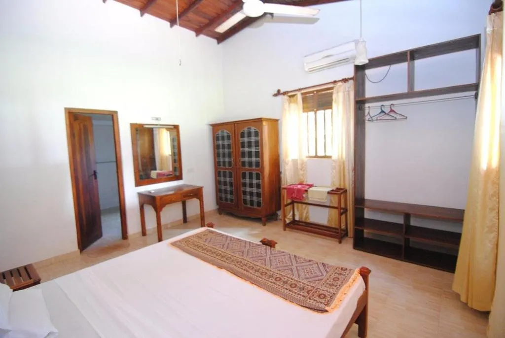 Bed in Mangrove villa - Yoga & Ayurveda
