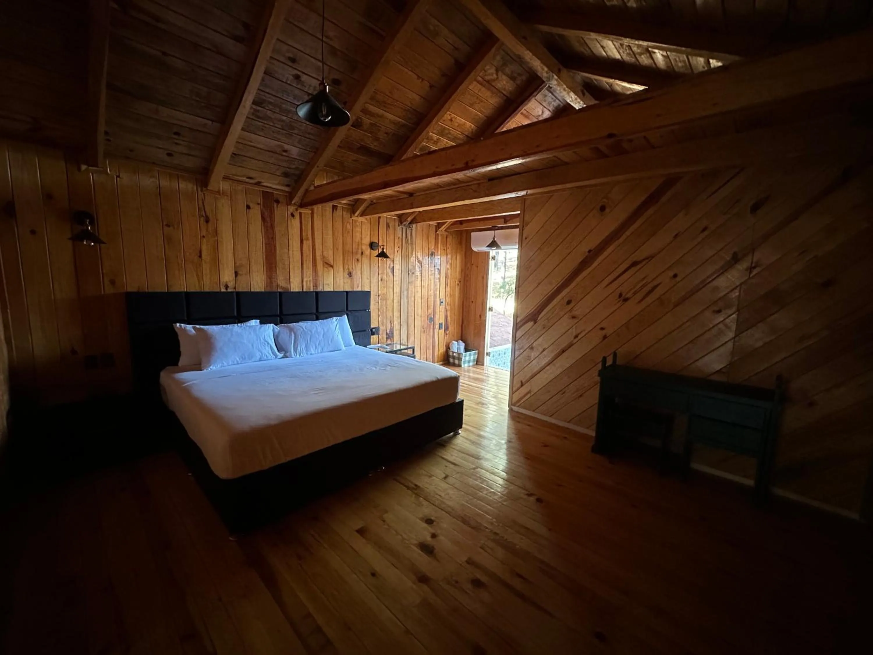 Photo of the whole room, Bed in PINE TREE Mazamitla Hotel Boutique & Cabañas