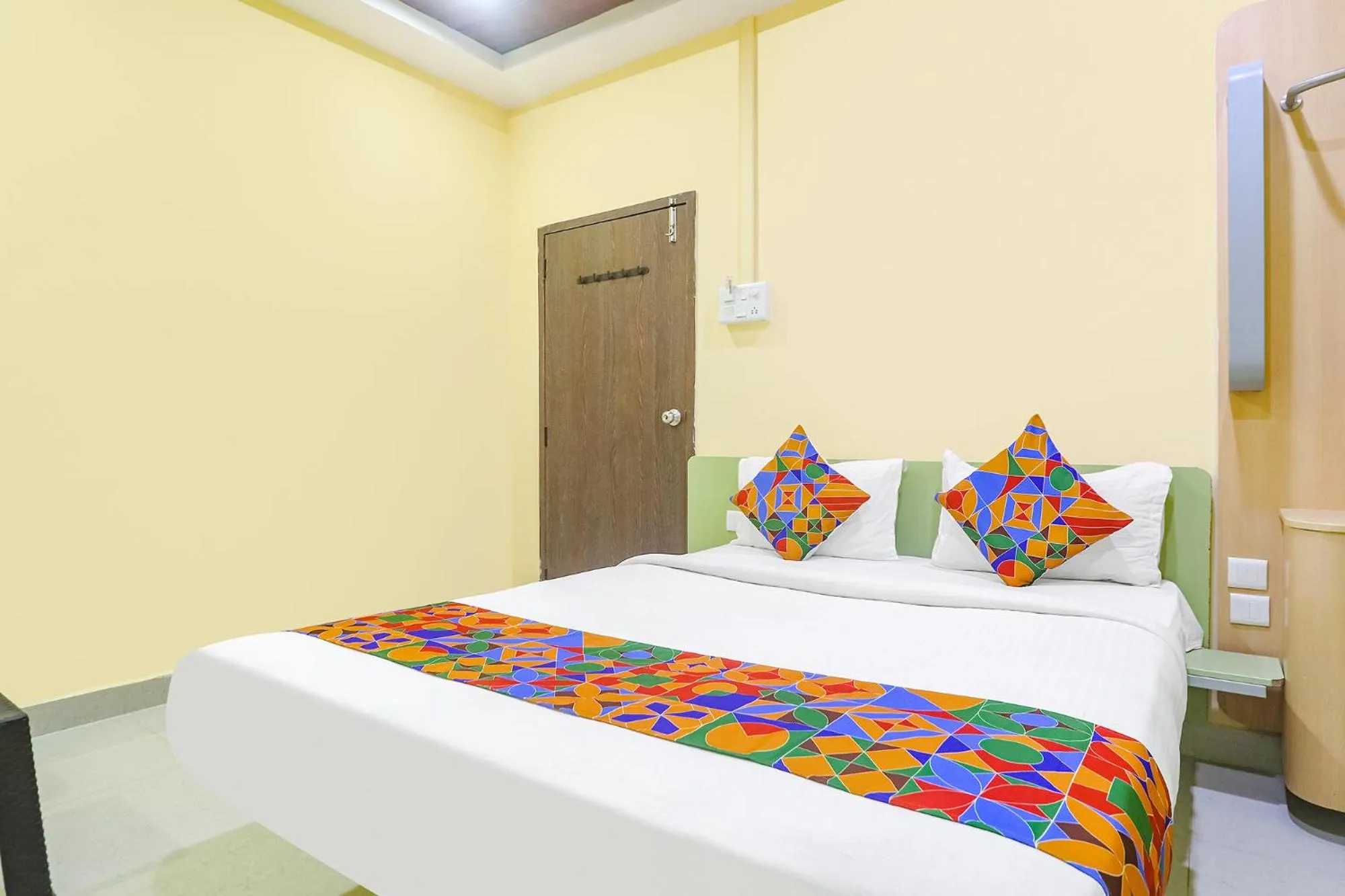 Photo of the whole room, Bed in FabExpress Airport Stay Inn - Nr Hyderabad Airport