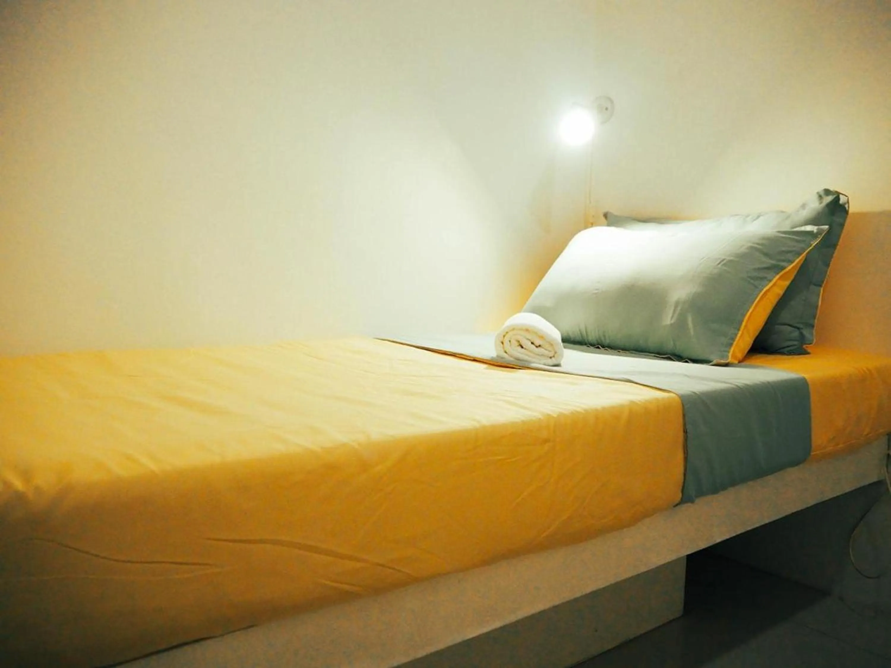 Bed in Wanderlust Bed and Breakfast Puerto Princesa
