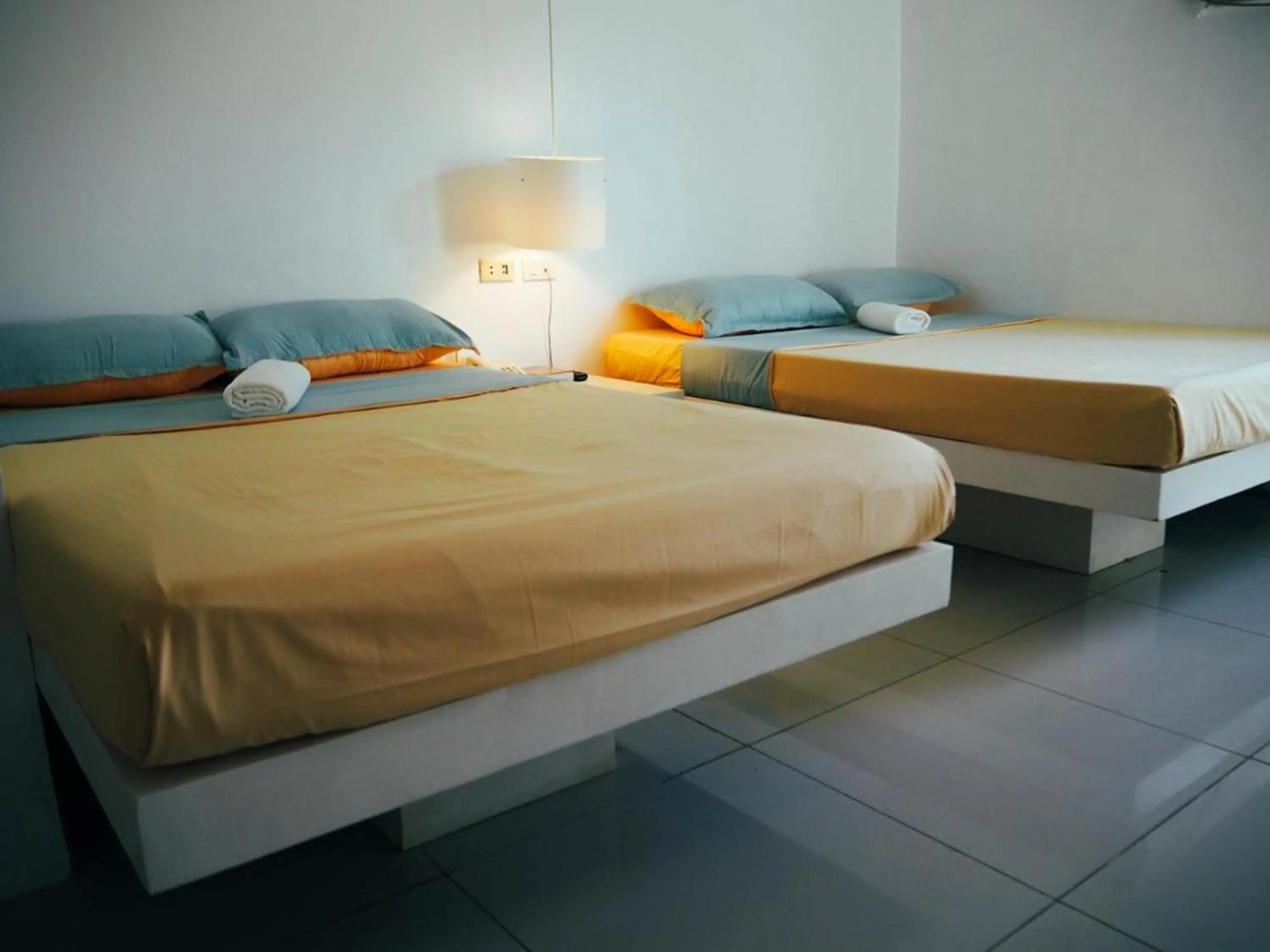 Bed in Wanderlust Bed and Breakfast Puerto Princesa