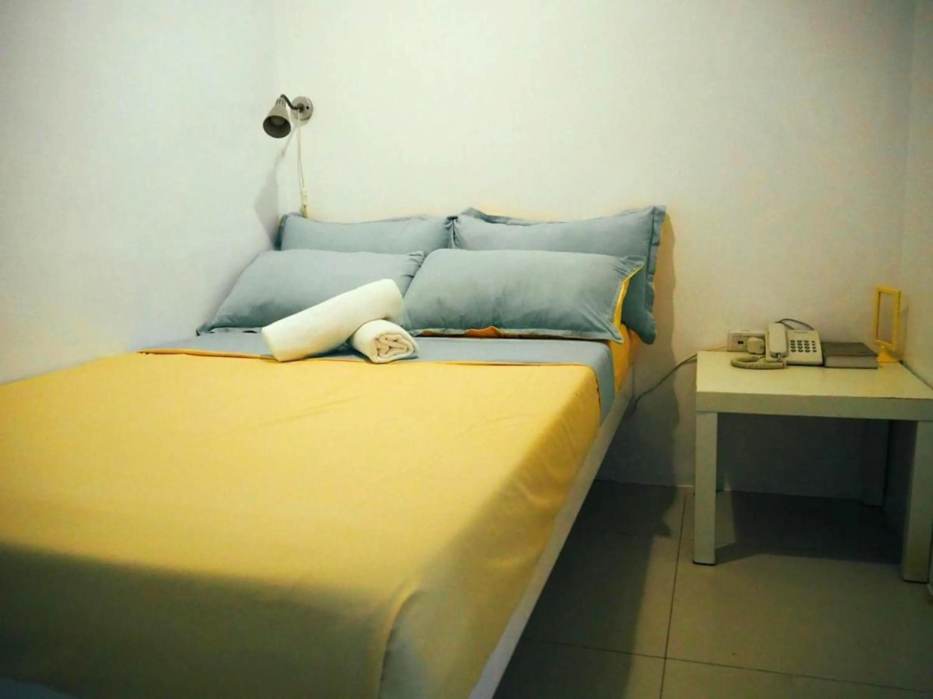 Bed in Wanderlust Bed and Breakfast Puerto Princesa