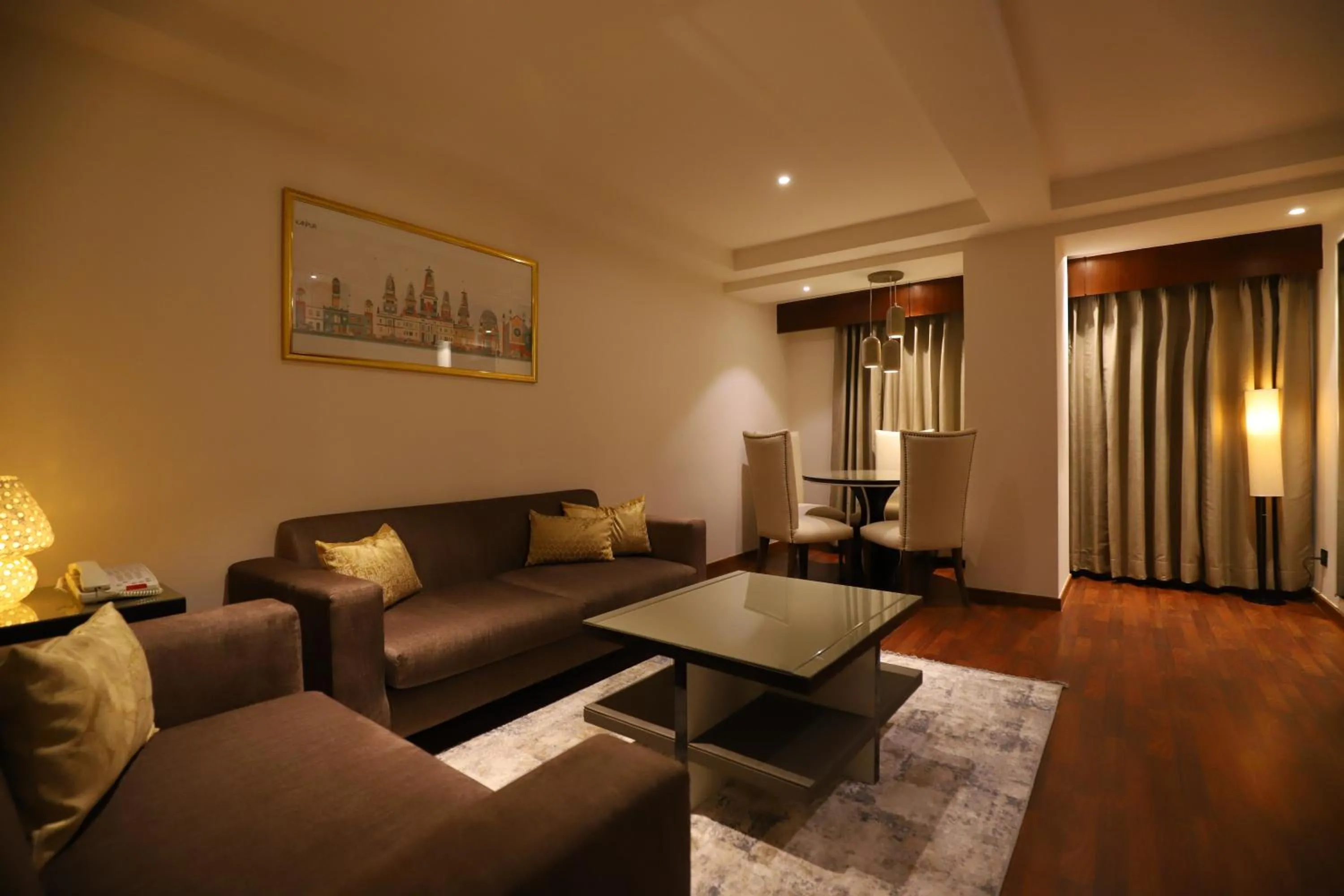 Living room, Bed in The Pristine Hotel