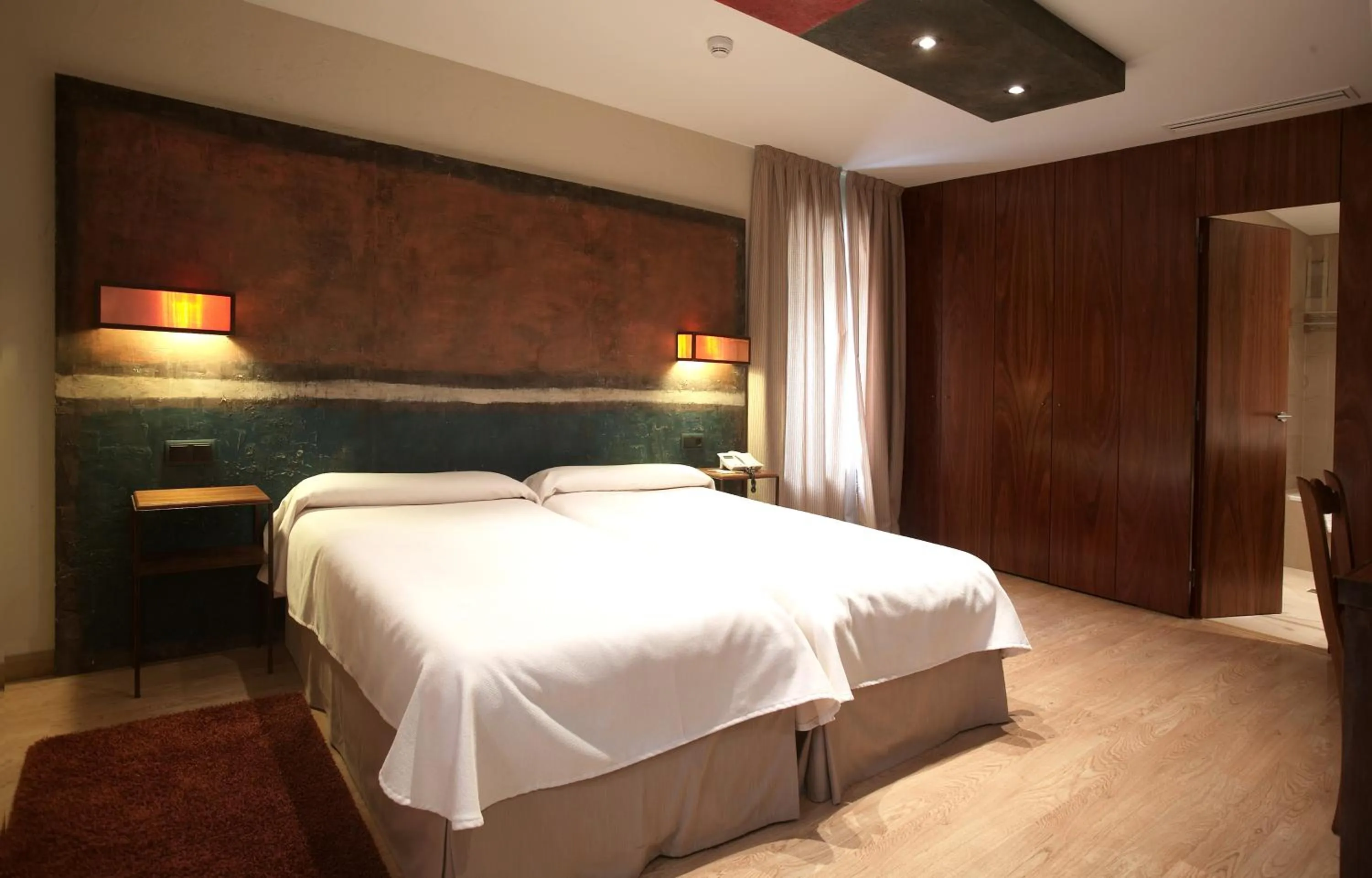 Bed in Hotel Santa Cristina Petit Spa