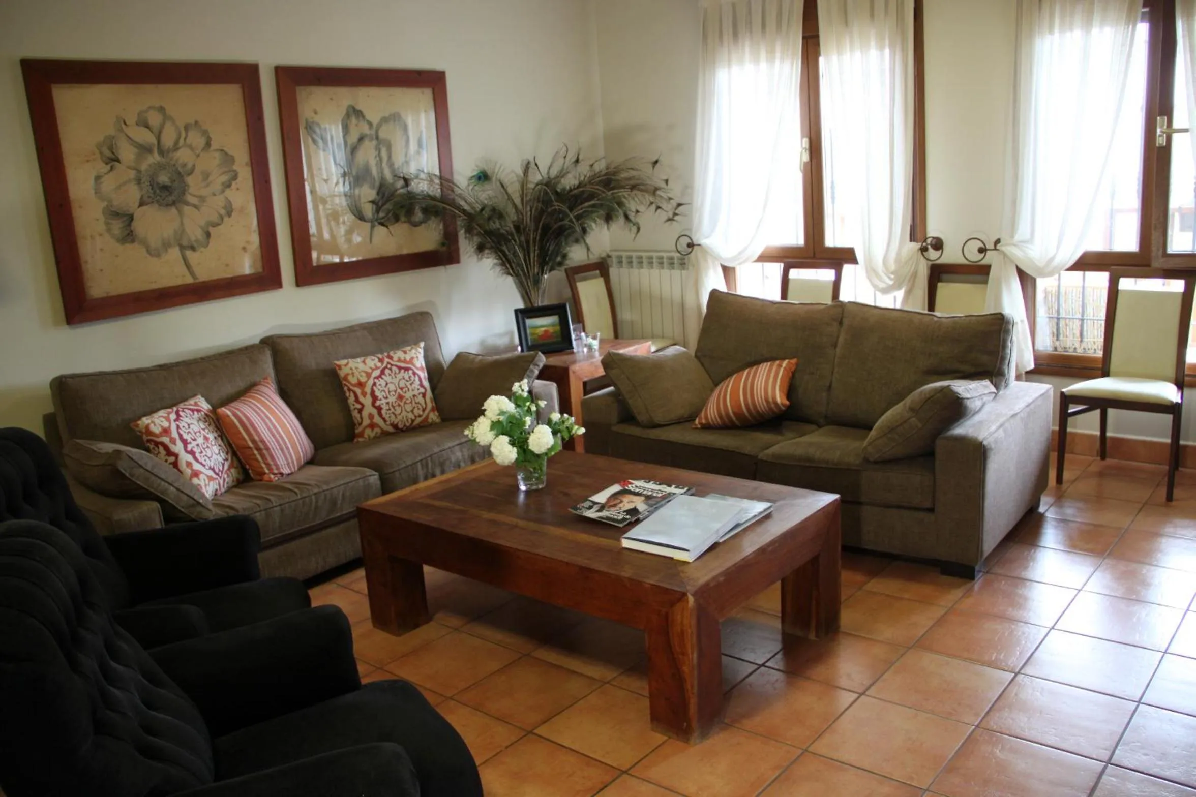 Communal lounge/ TV room in Villa Mencia