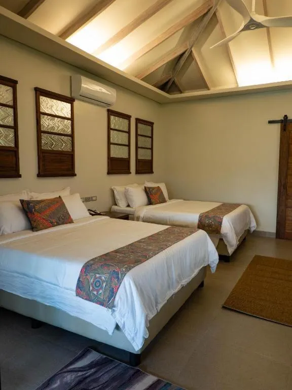 Bed in Kaimana Resort Siargao