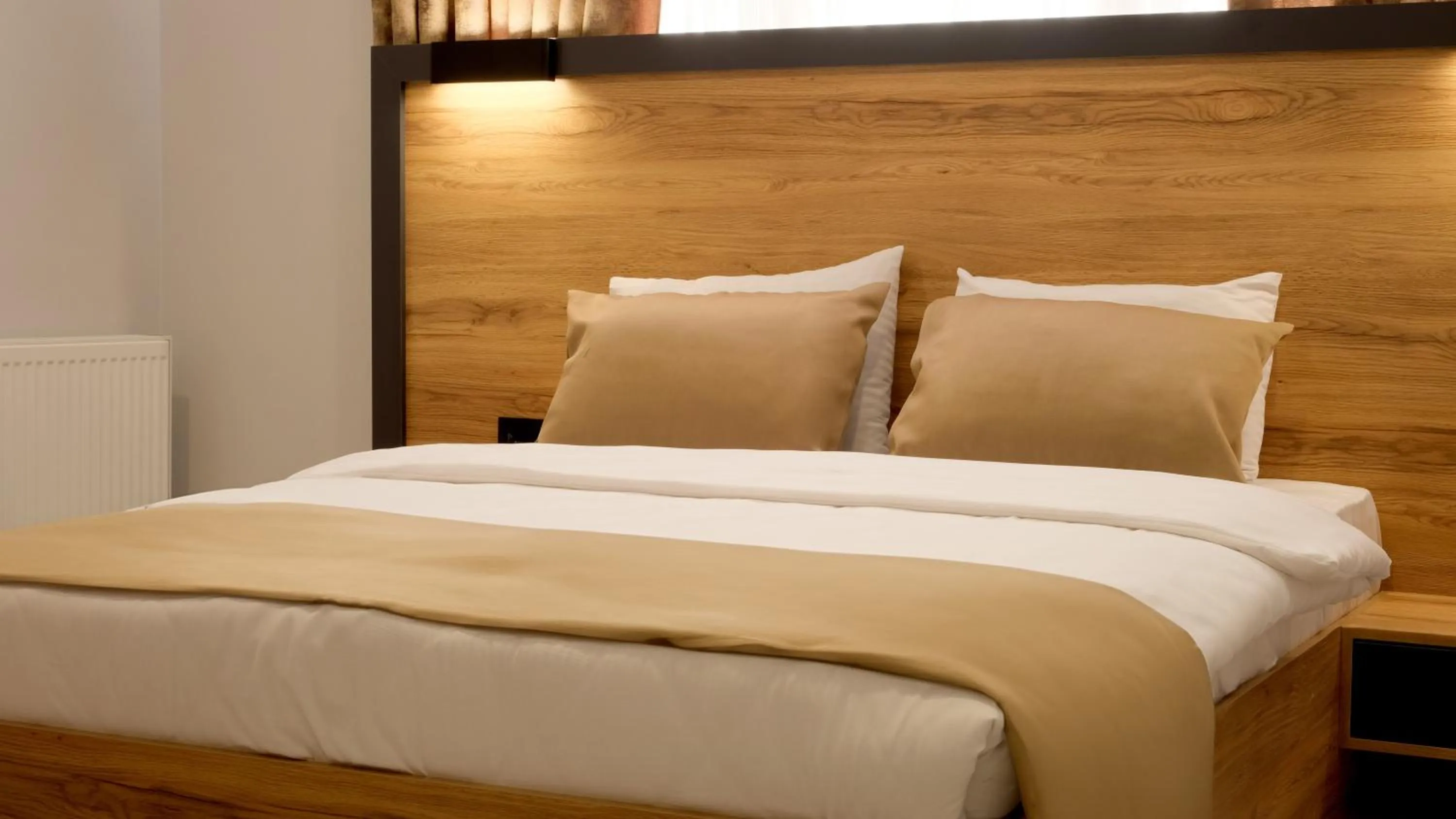 Bed in Sirius Hotel Deluxe