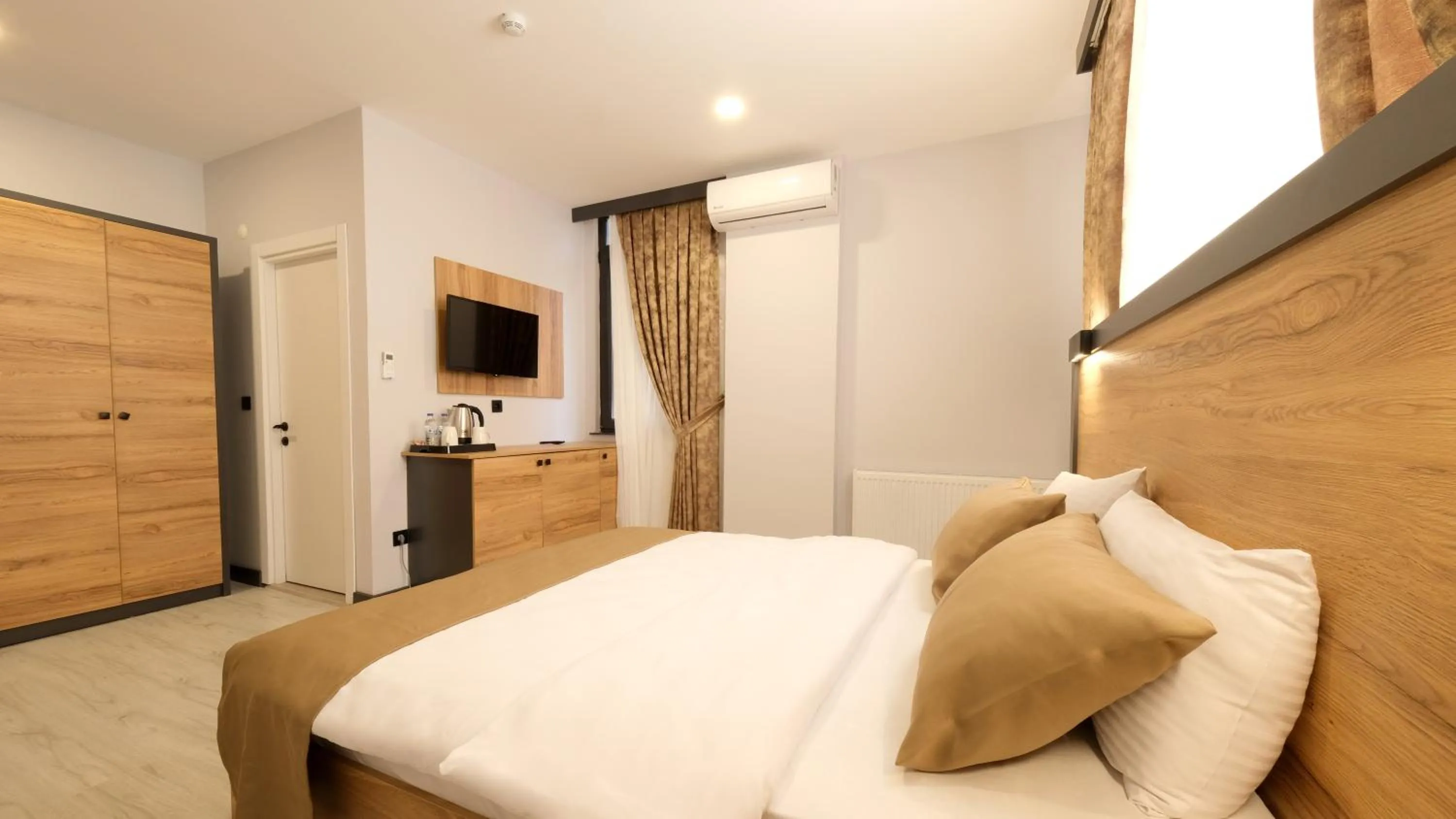 Bed in Sirius Hotel Deluxe