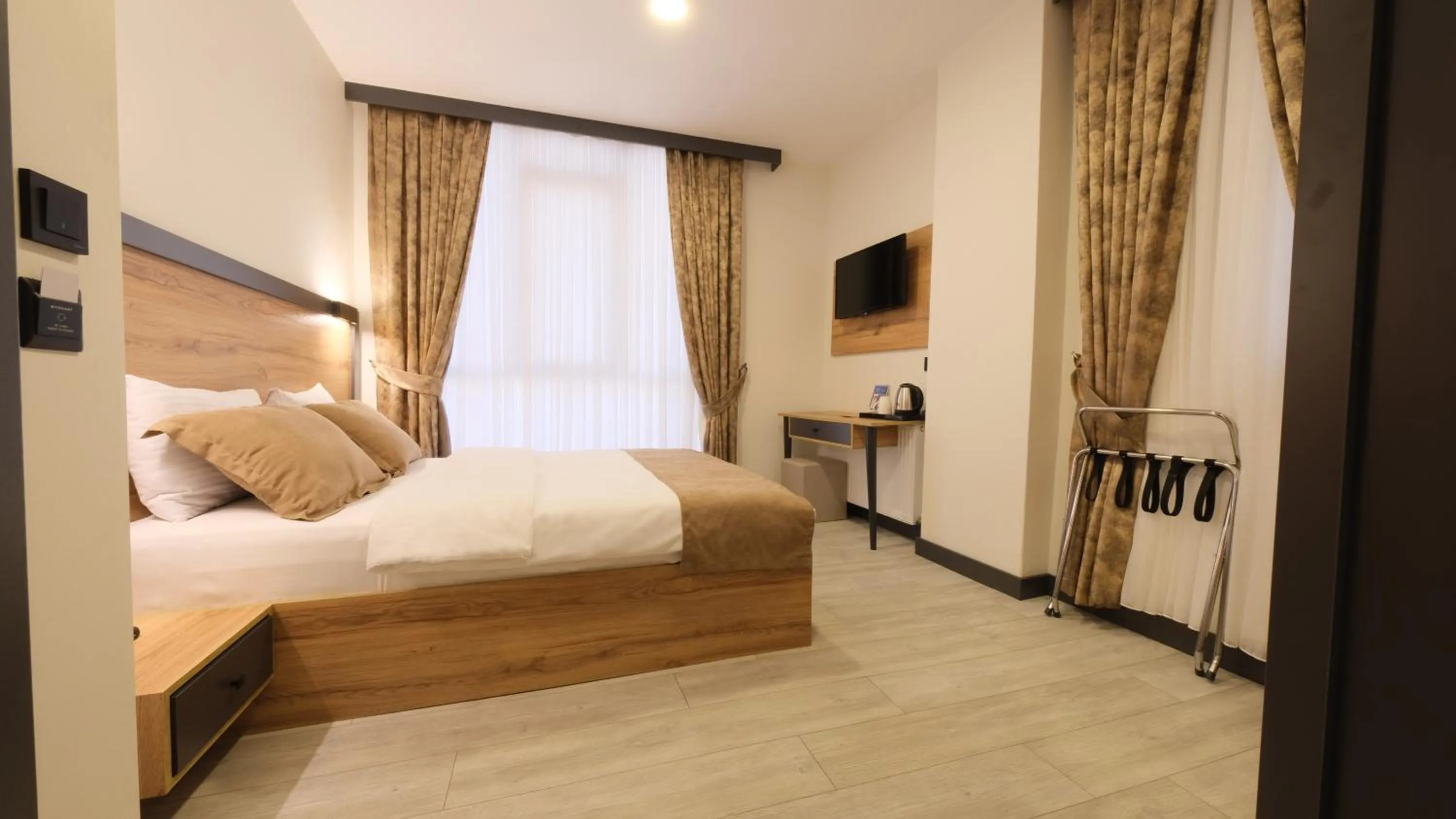 Bed in Sirius Hotel Deluxe