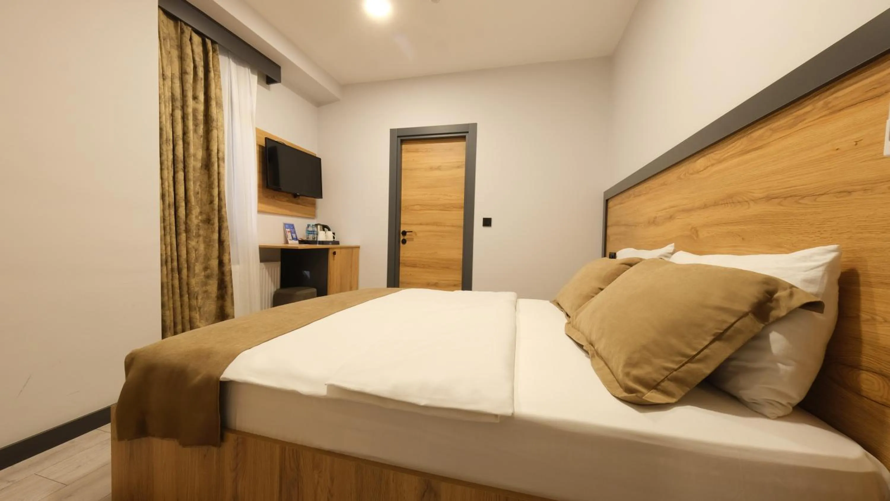 Bed in Sirius Hotel Deluxe