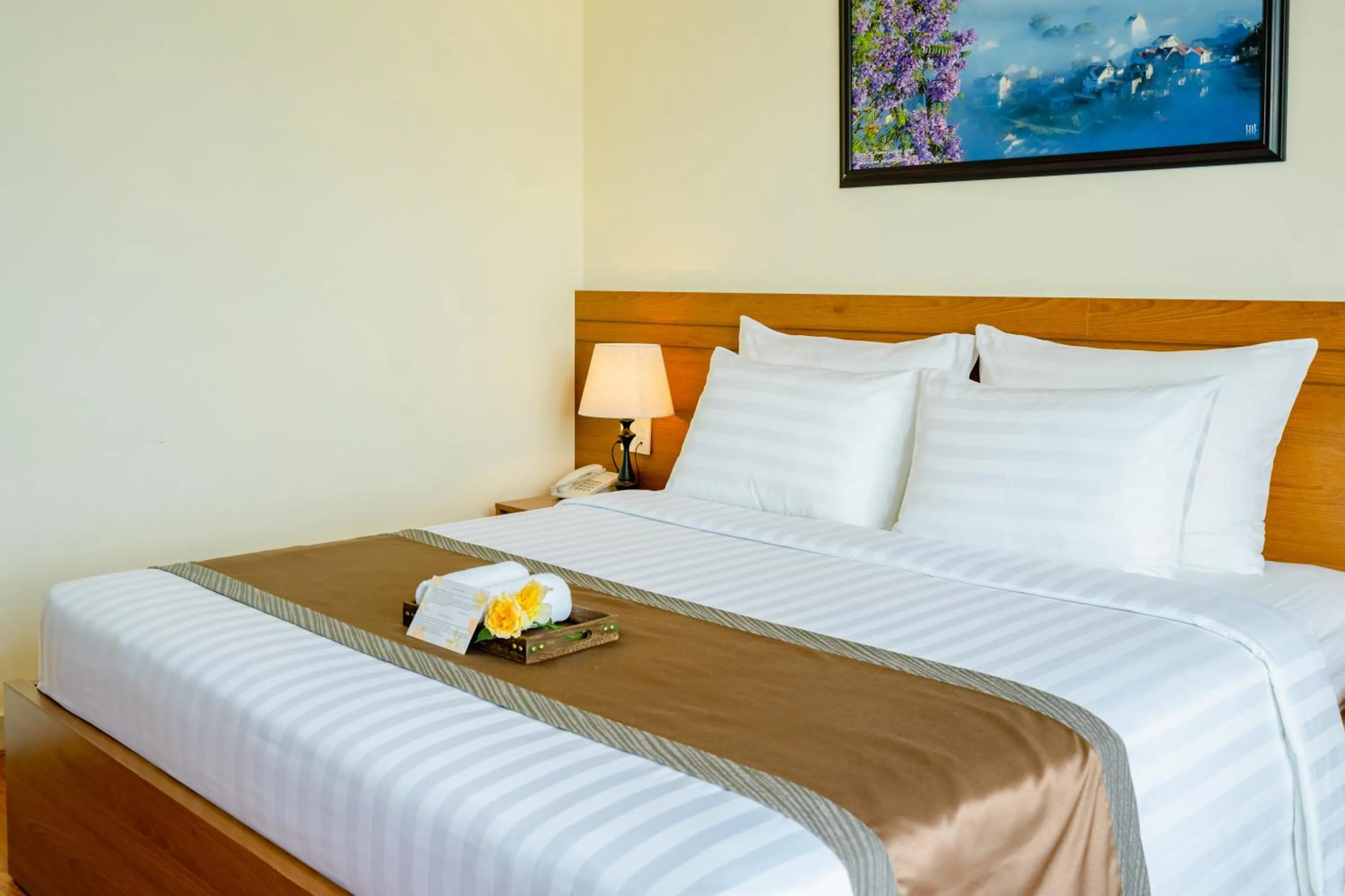 Property building, Bed in Bombo DaLat Hotel