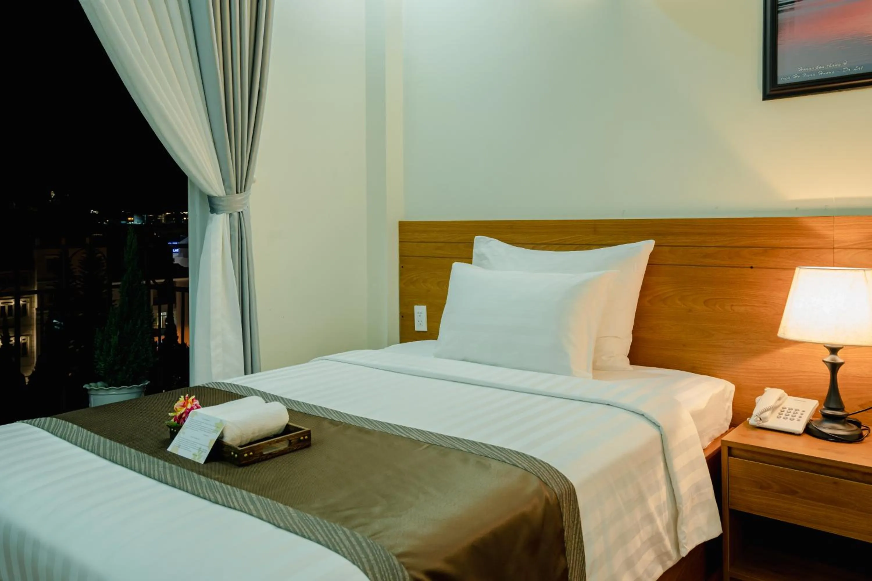 Photo of the whole room, Bed in Bombo DaLat Hotel