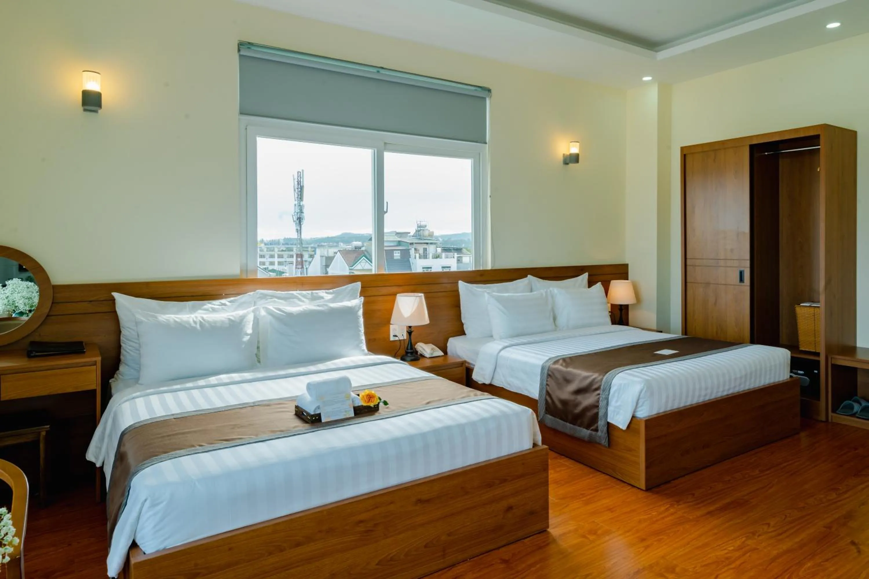 Property building, Bed in Bombo DaLat Hotel